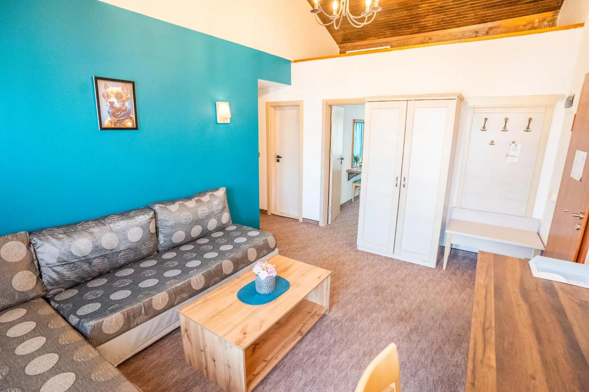 Communal lounge/ TV room in Royal Calisto Hotel