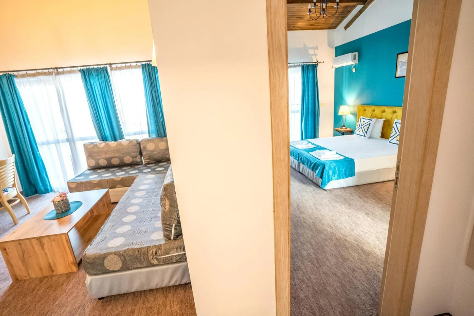 Living room, Bed in Royal Calisto Hotel