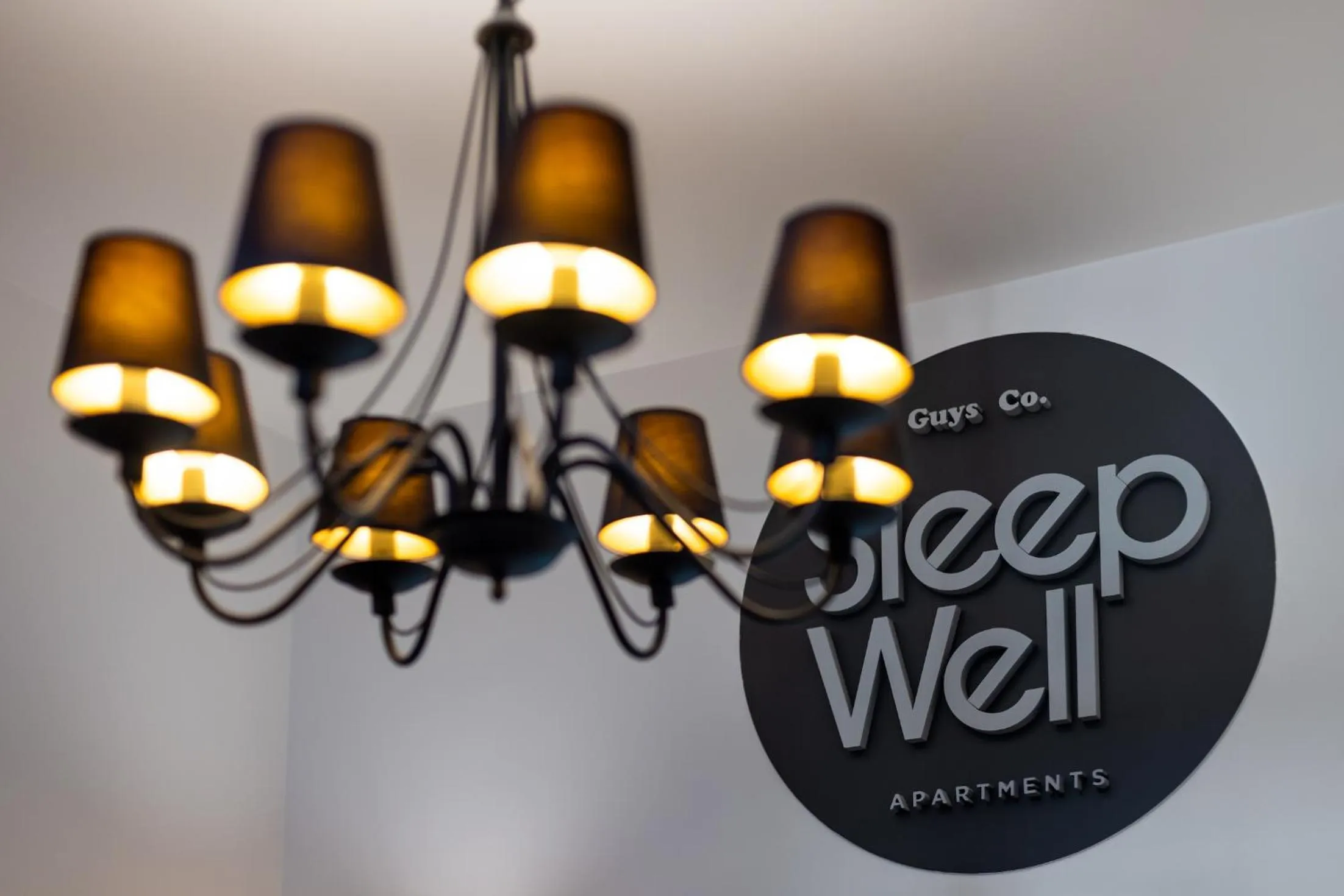 Property logo or sign in SLEEPWELL NOWY ŚWIAT - entrance from Ordynacka 14St, through the courtyard