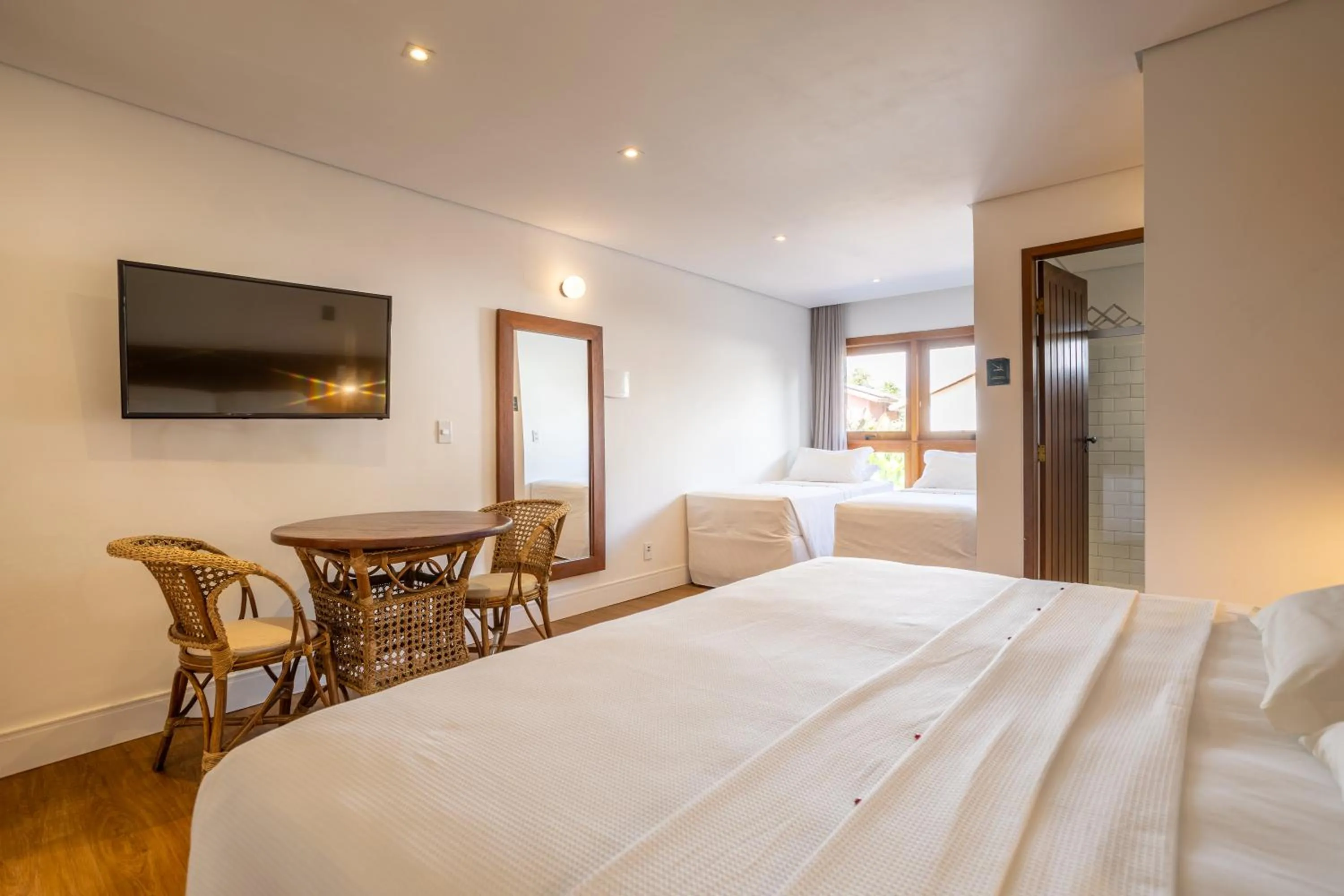 Property building, Bed in Pousada Cheiro Verde