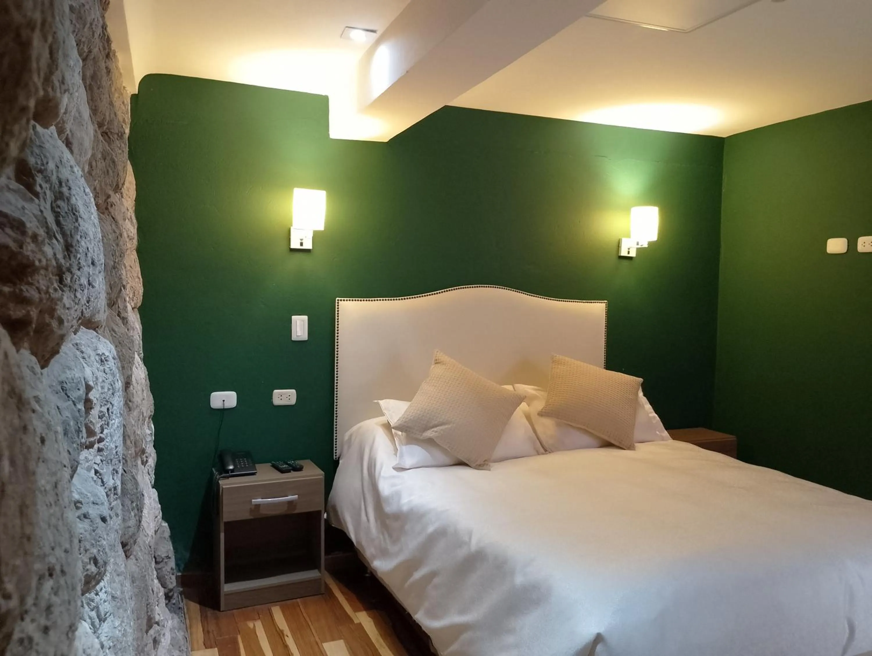 Bed in Anden Inca Hotel