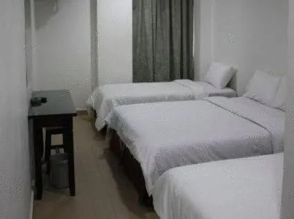Bed in Dynasty Inn - Wakaf Che Yeh