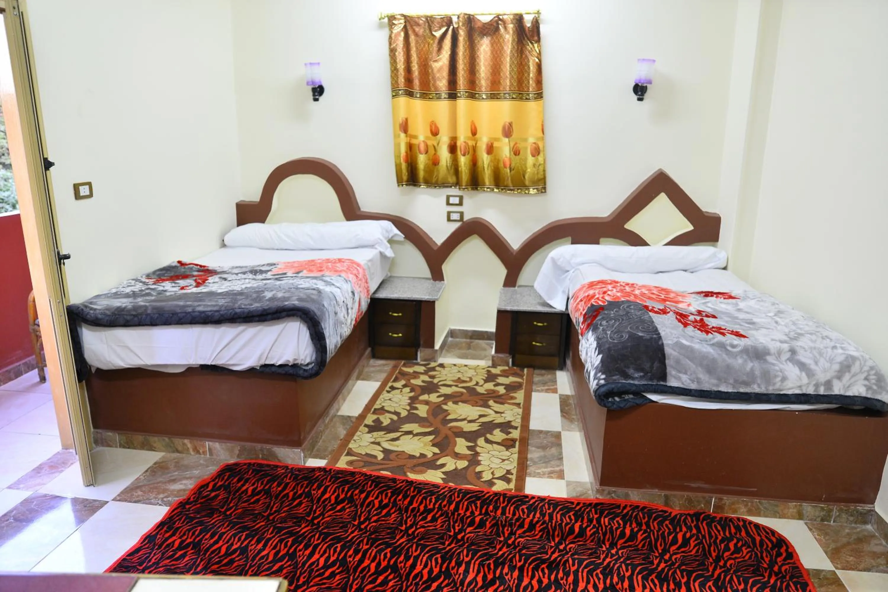 Bed in El Prince Guesthouse