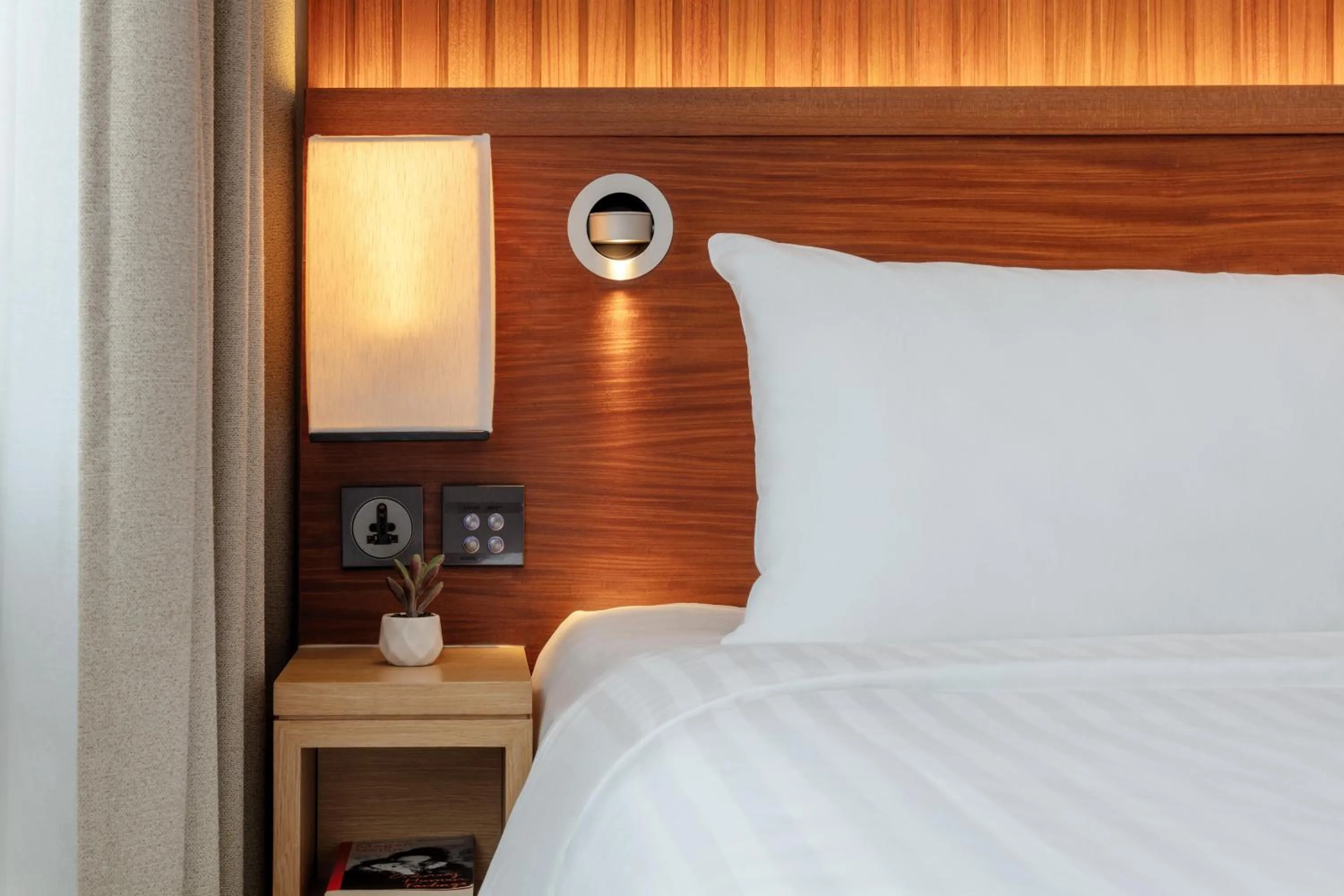 Bed in Oasia Resort Sentosa by Far East Hospitality