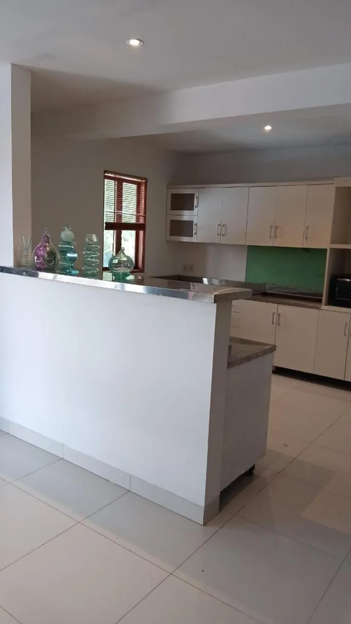 Kitchen or kitchenette in Kupu Kupu Jimbaran Beach Hotel & Spa by L’Occitane