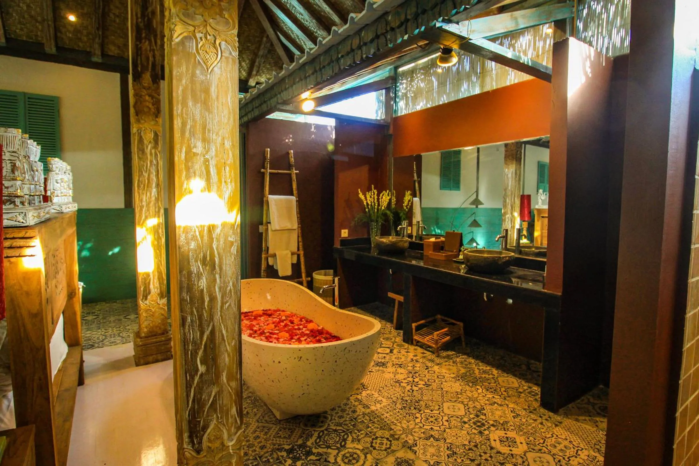 Bathroom in Kupu Kupu Jimbaran Beach Hotel & Spa by L’Occitane