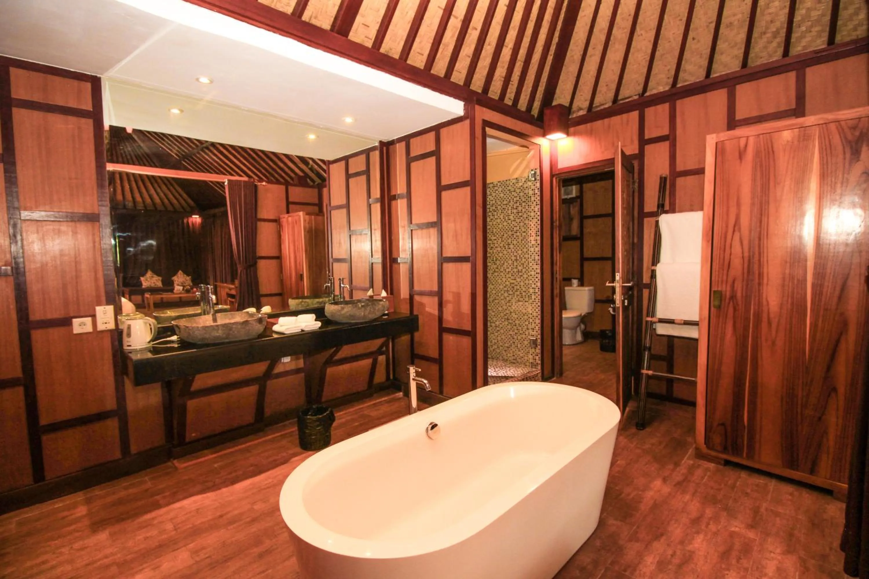 Bath in Kupu Kupu Jimbaran Beach Hotel & Spa by L’Occitane
