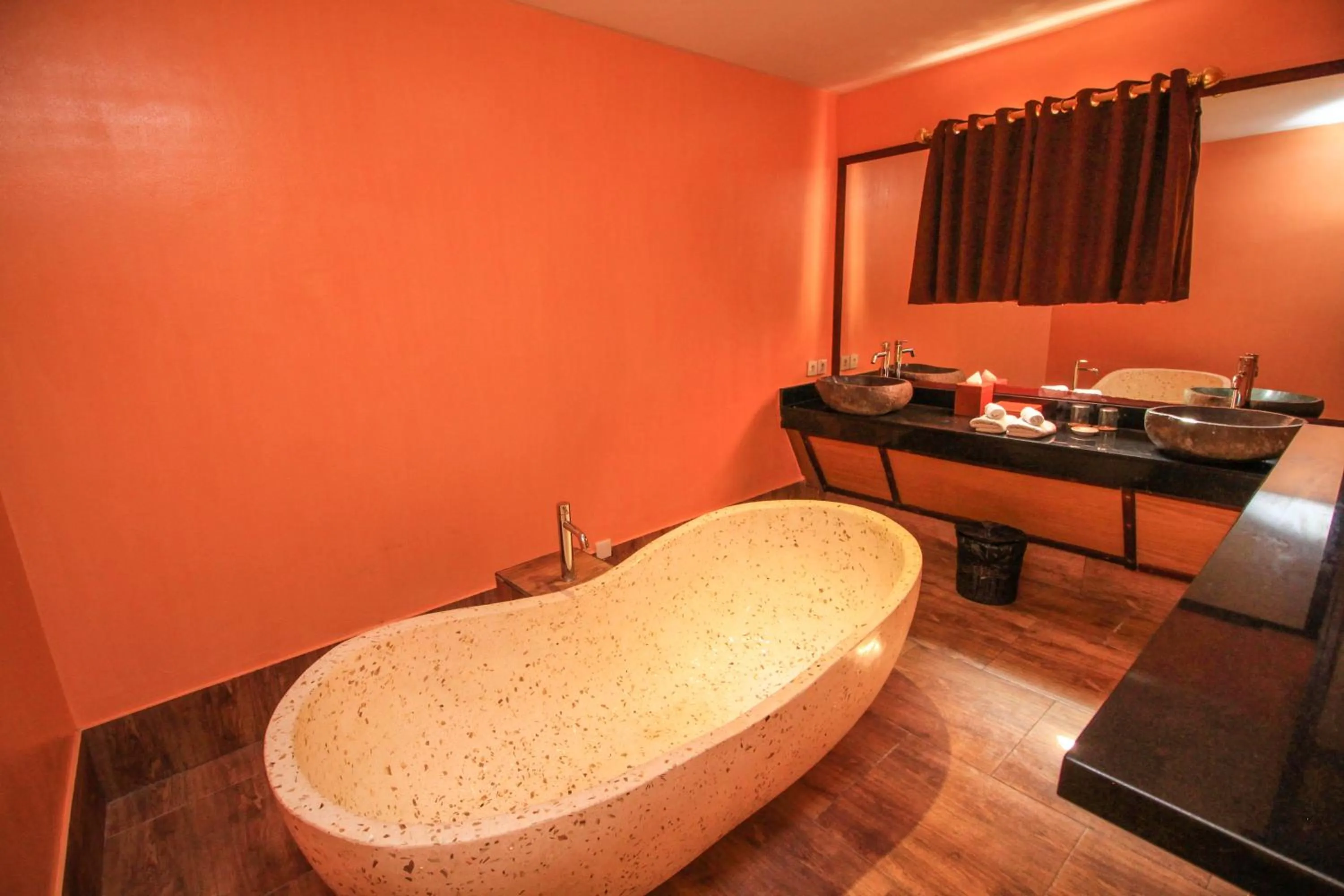 Bath in Kupu Kupu Jimbaran Beach Hotel & Spa by L’Occitane