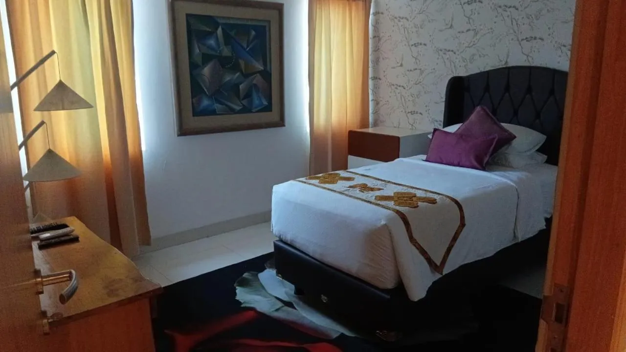 Bed in Kupu Kupu Jimbaran Beach Hotel & Spa by L’Occitane