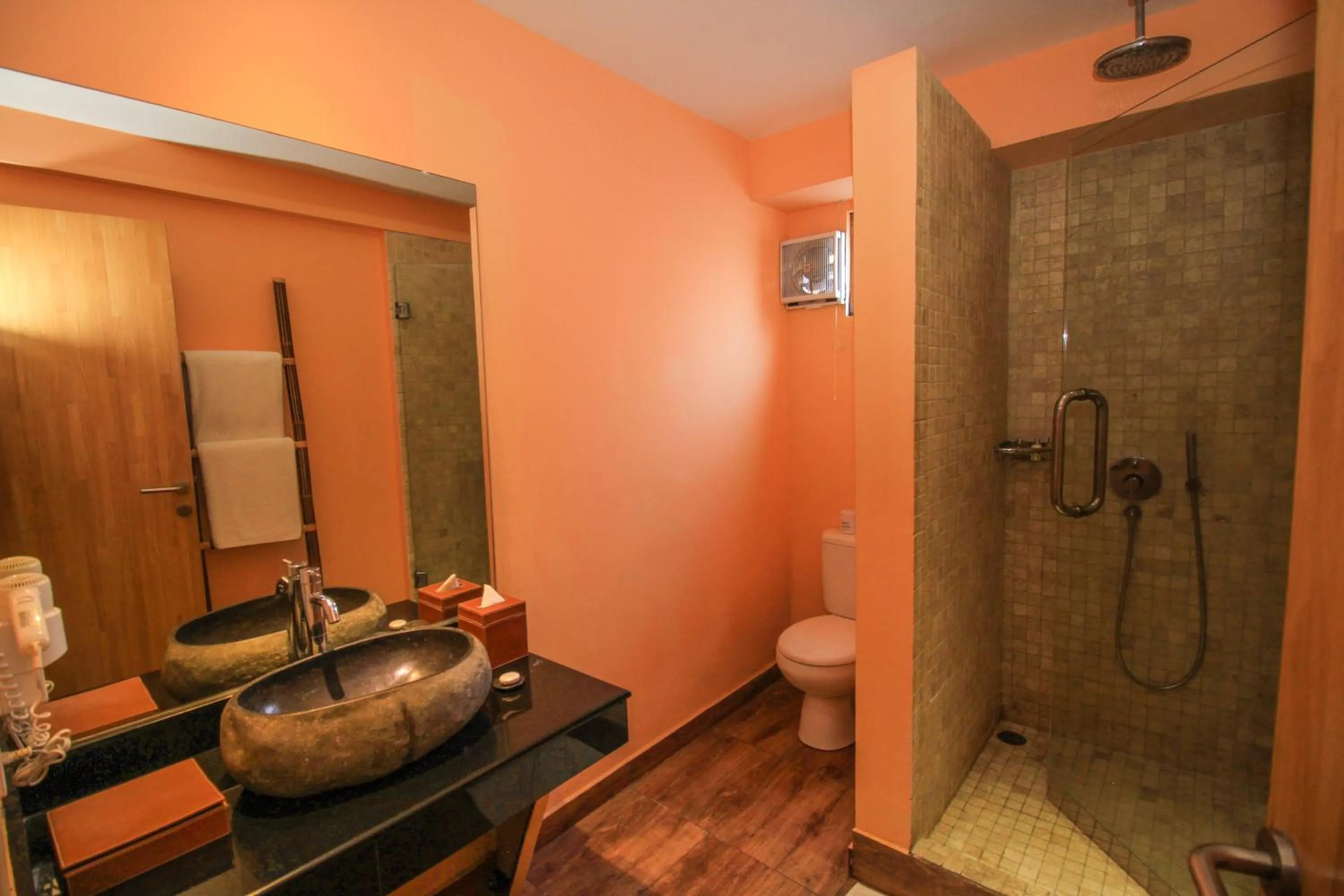 Bathroom in Kupu Kupu Jimbaran Beach Hotel & Spa by L’Occitane