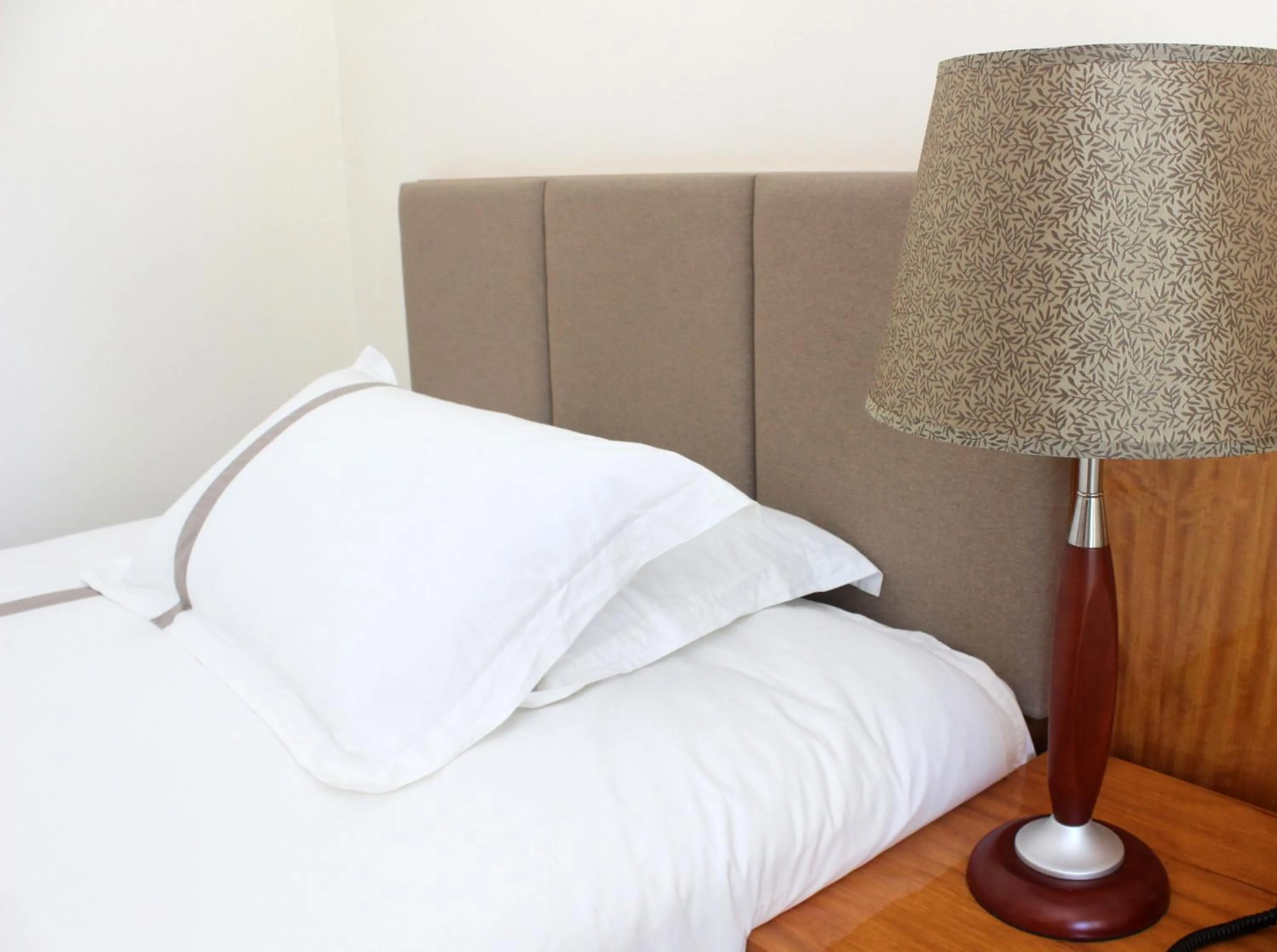 Bed in Saipan Beach Hotel