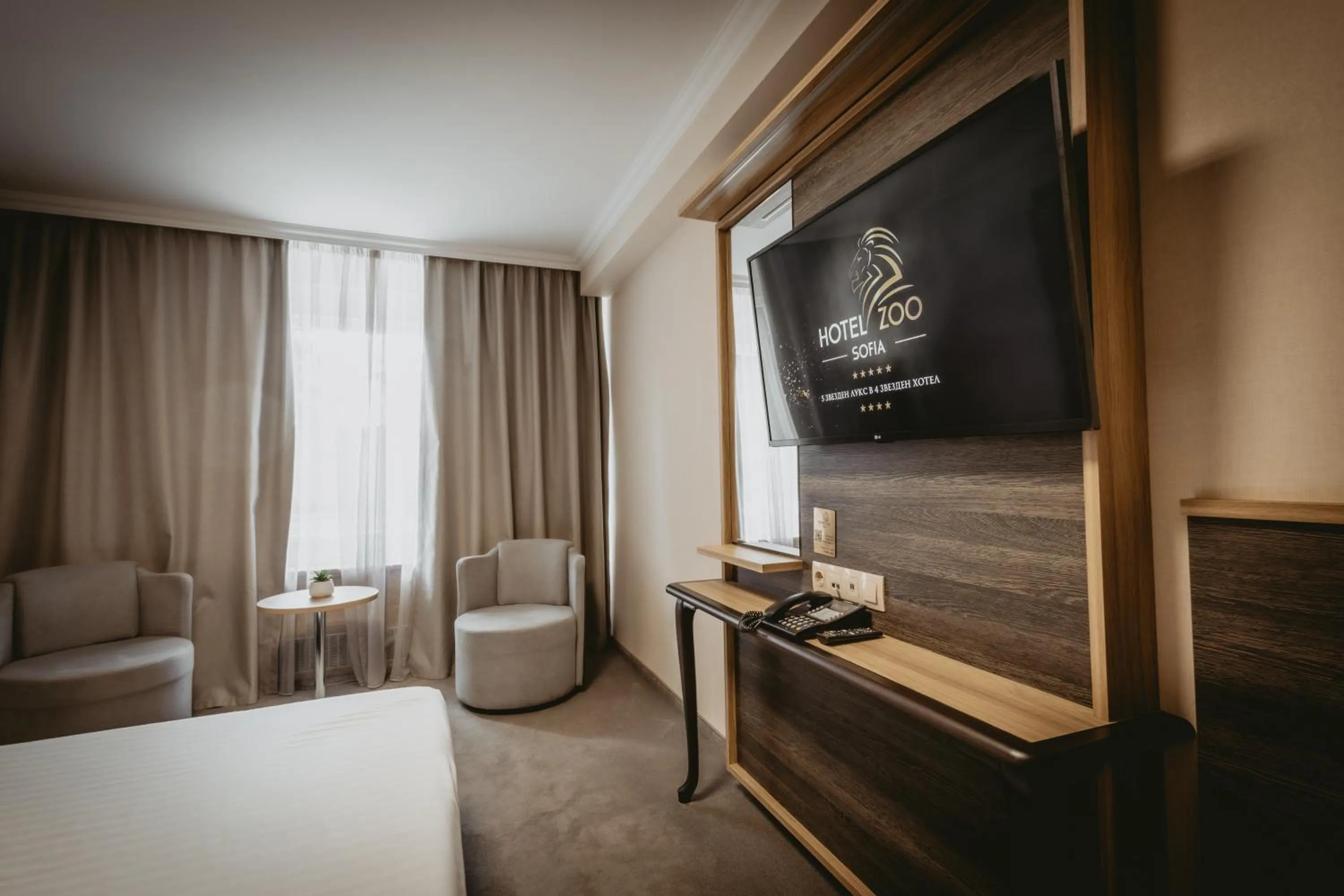 Communal lounge/ TV room, Bed in Hotel ZOO Sofia