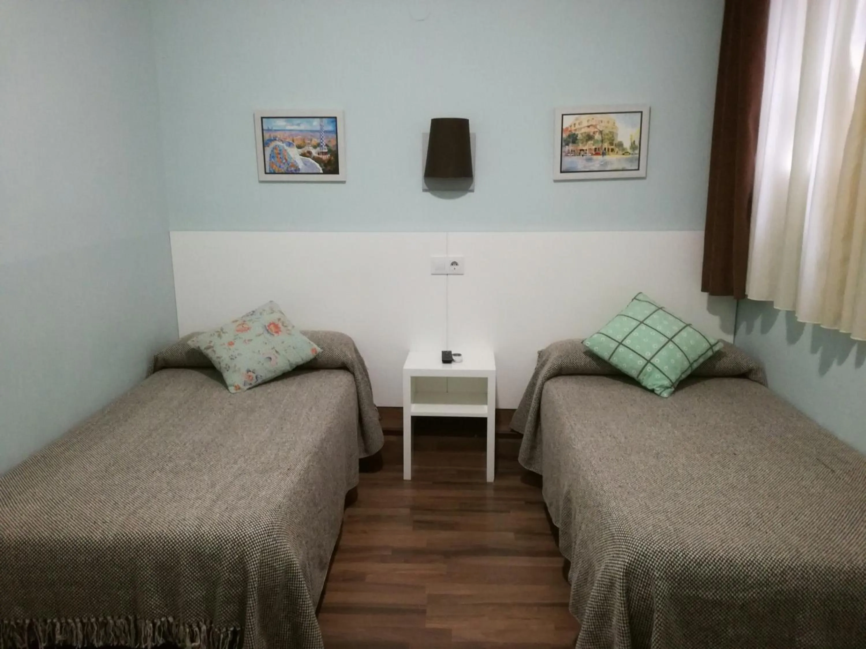 Bed in Hostal Lesseps