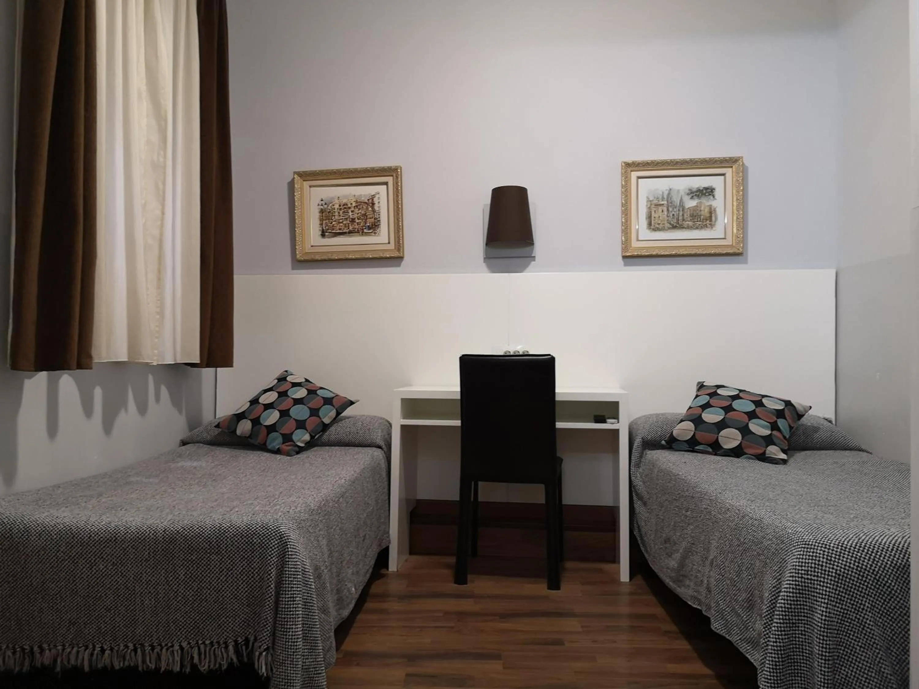 Bed in Hostal Lesseps