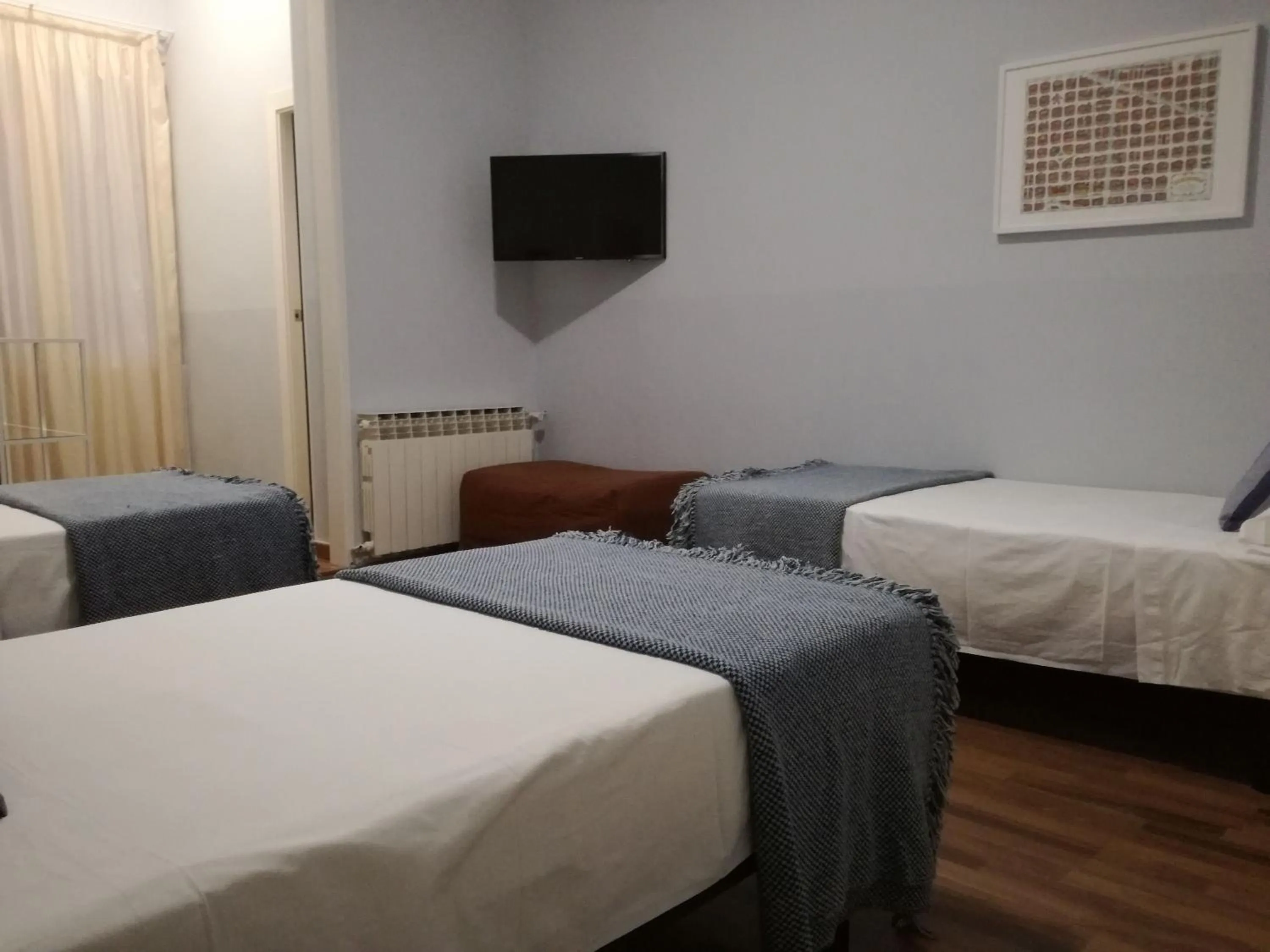 Photo of the whole room, Bed in Hostal Lesseps