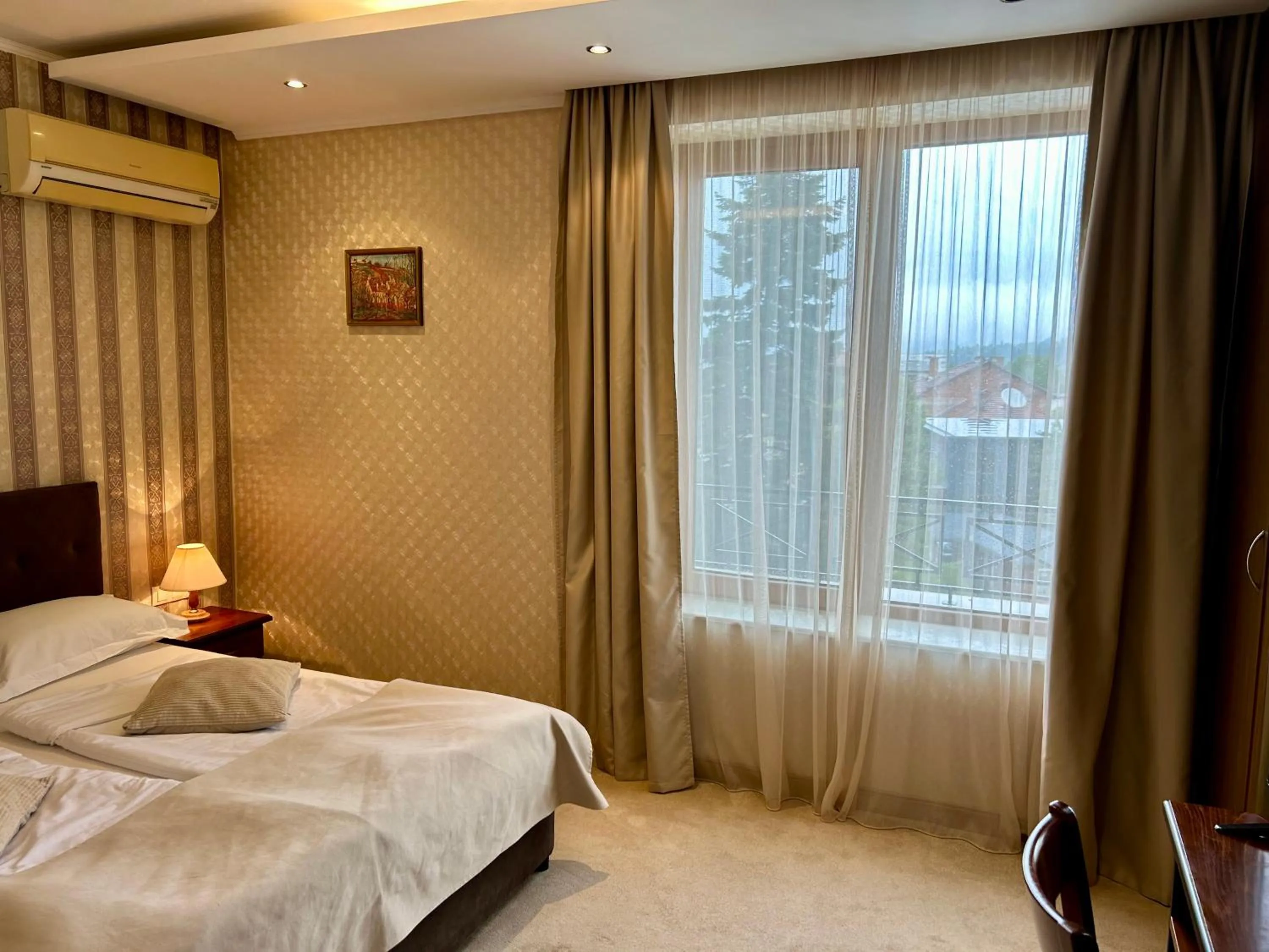 Bed in Chateau Montagne Hotel Troyan