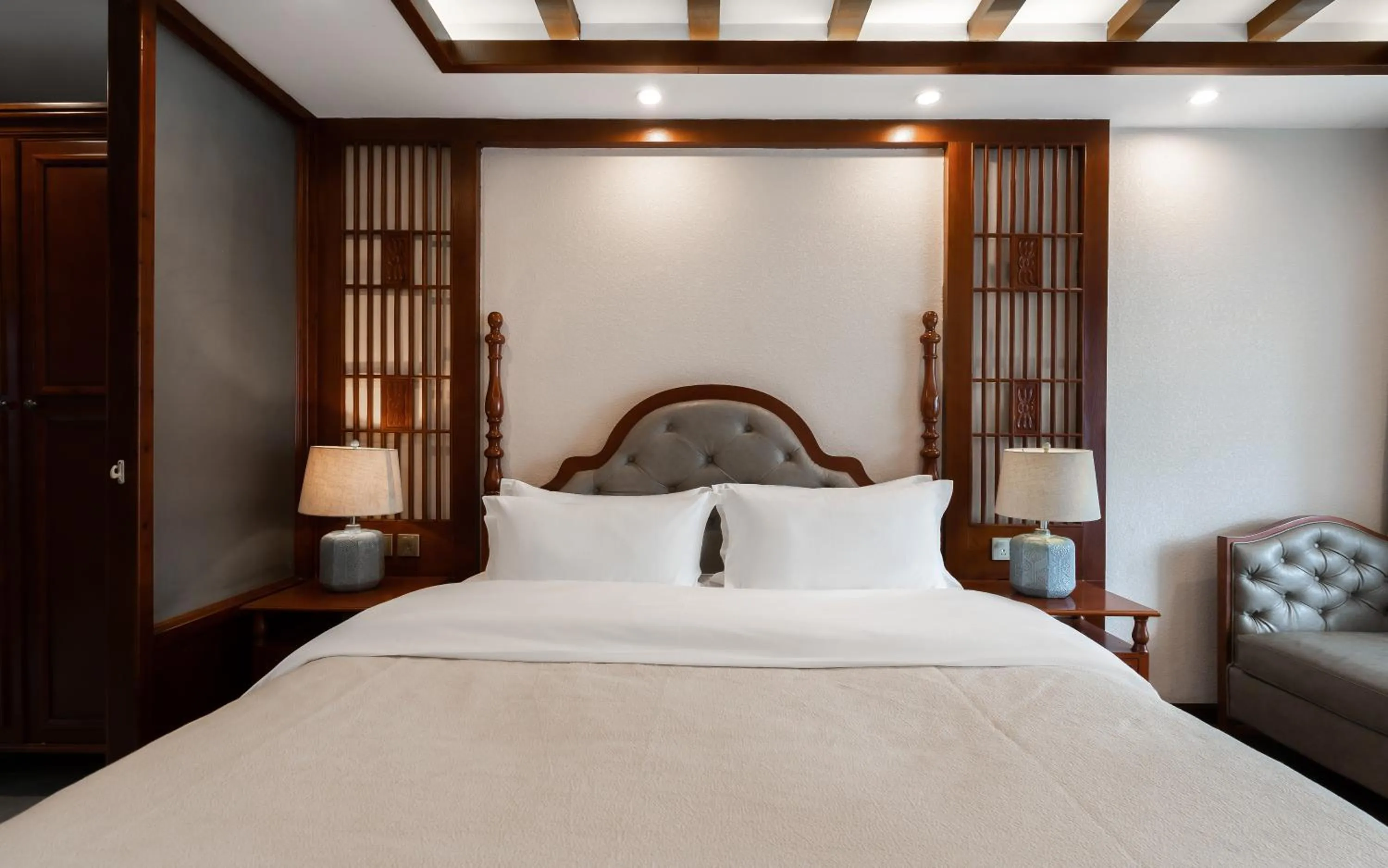 Bed in Lijiang Gemmer Hotel