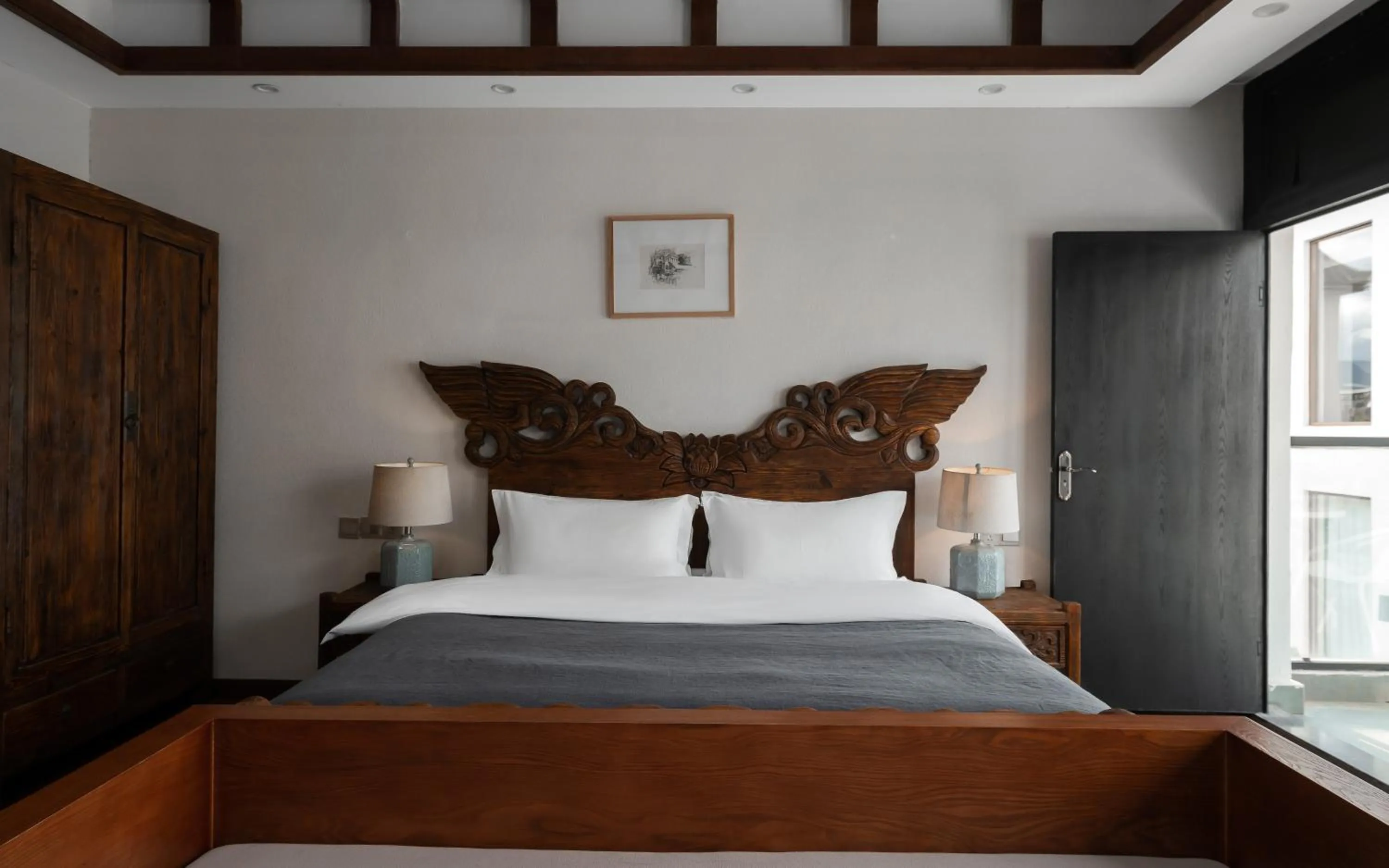 Bed in Lijiang Gemmer Hotel