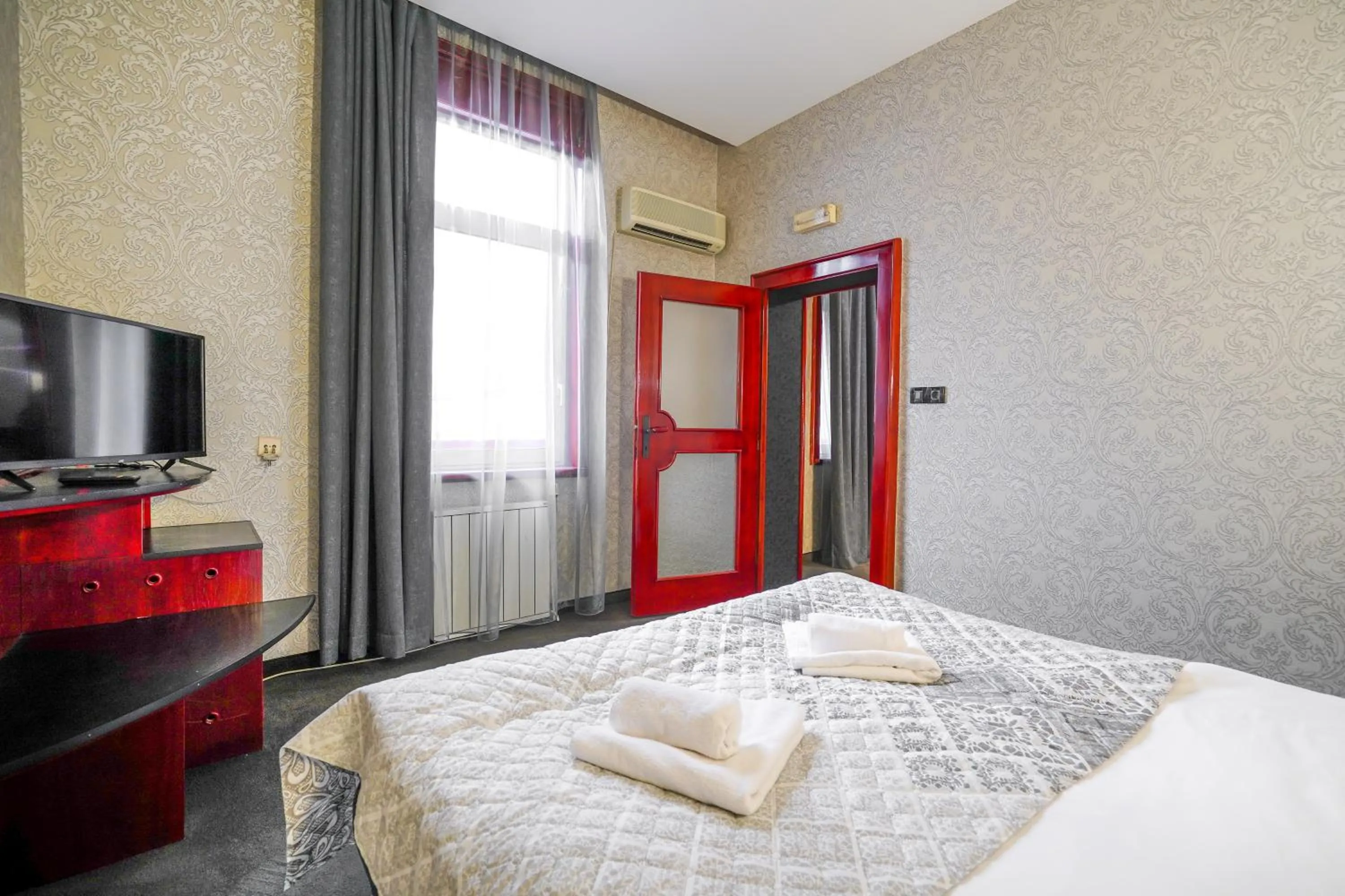 Bed in Gloria Palace Hotel