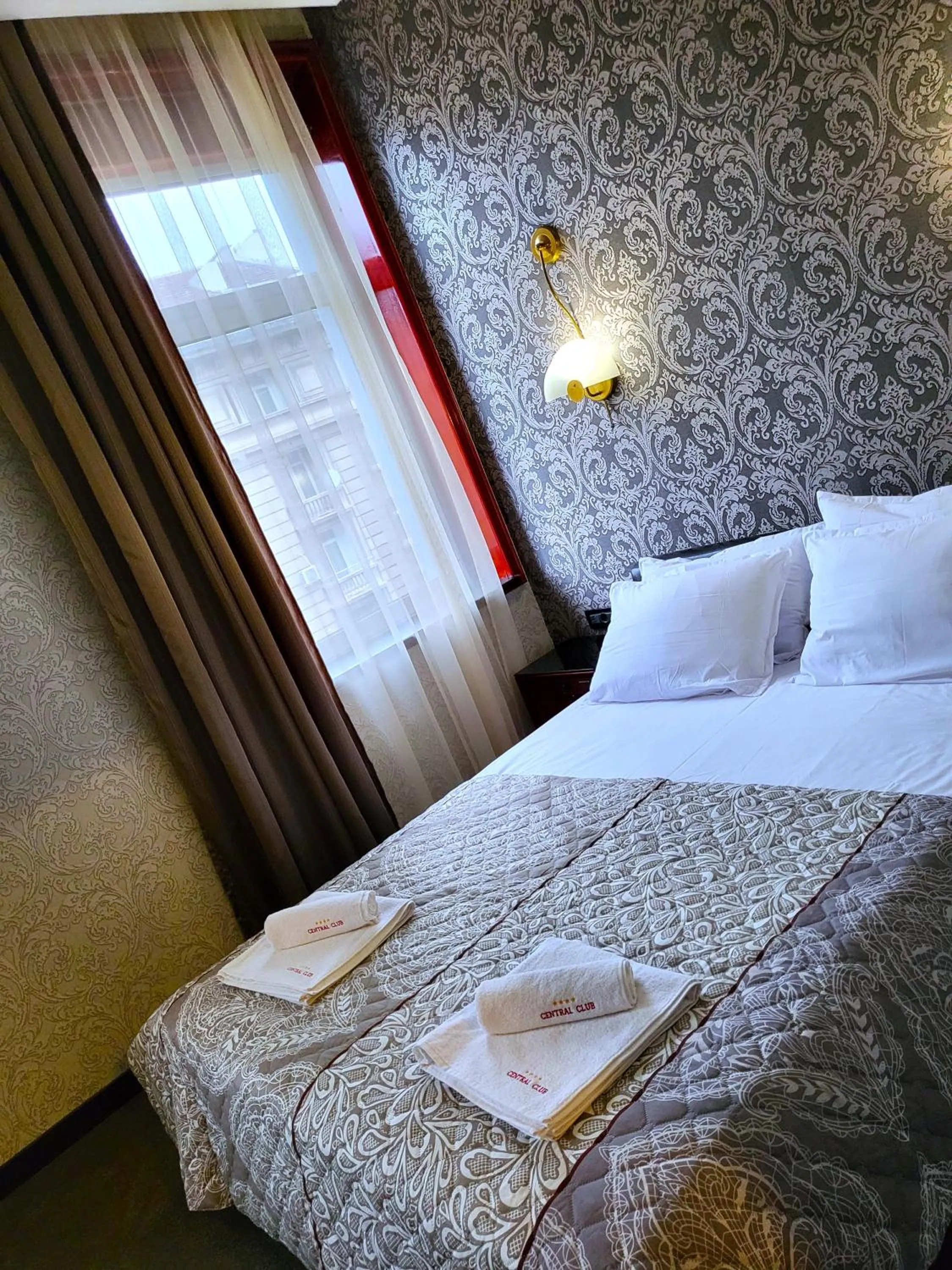 Bed in Gloria Palace Hotel