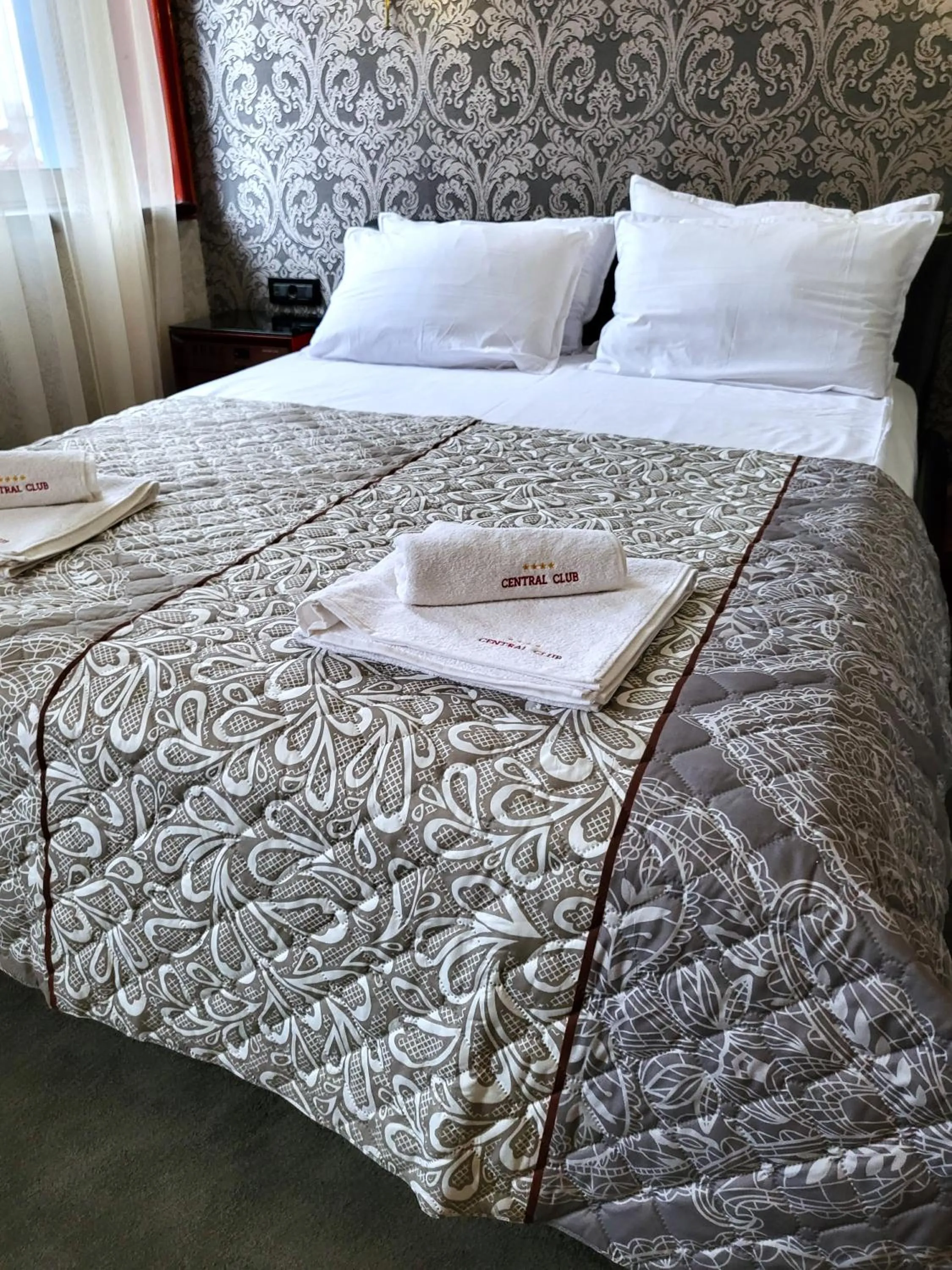 Bed in Gloria Palace Hotel