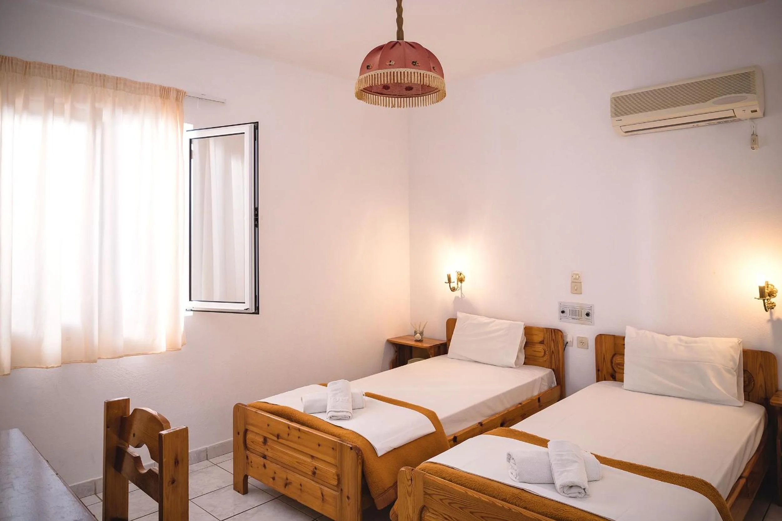 Bed in Primavera Paradise Apartments