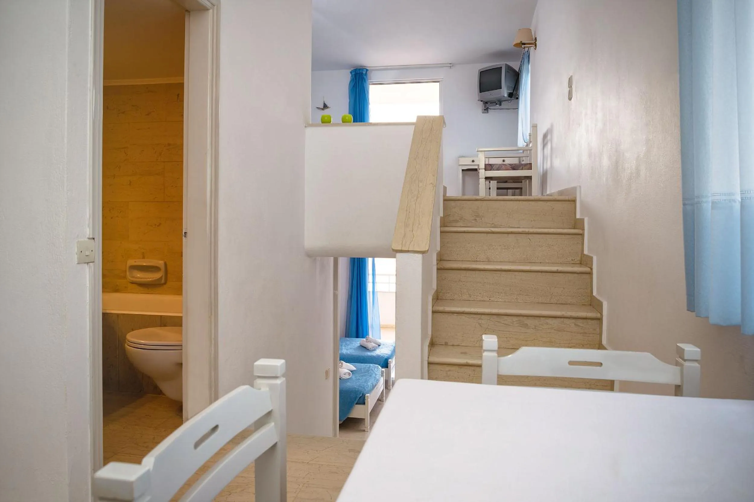 Bed in Primavera Paradise Apartments