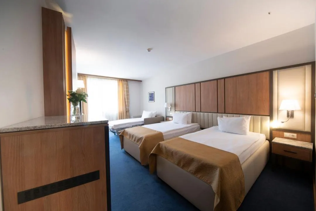 Bed in Legends Hotel