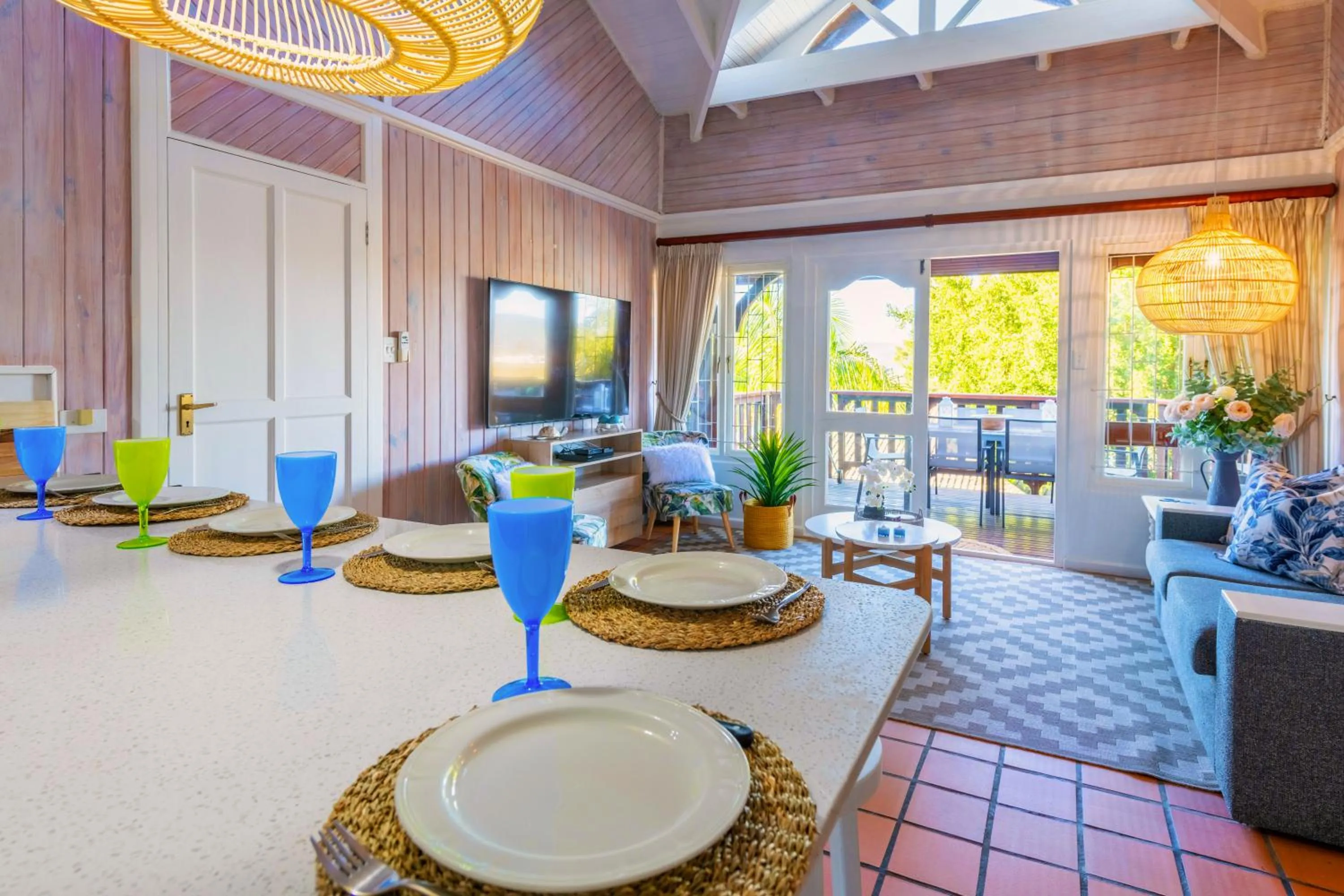 Communal lounge/ TV room in Knysna River Club by First Private Stays