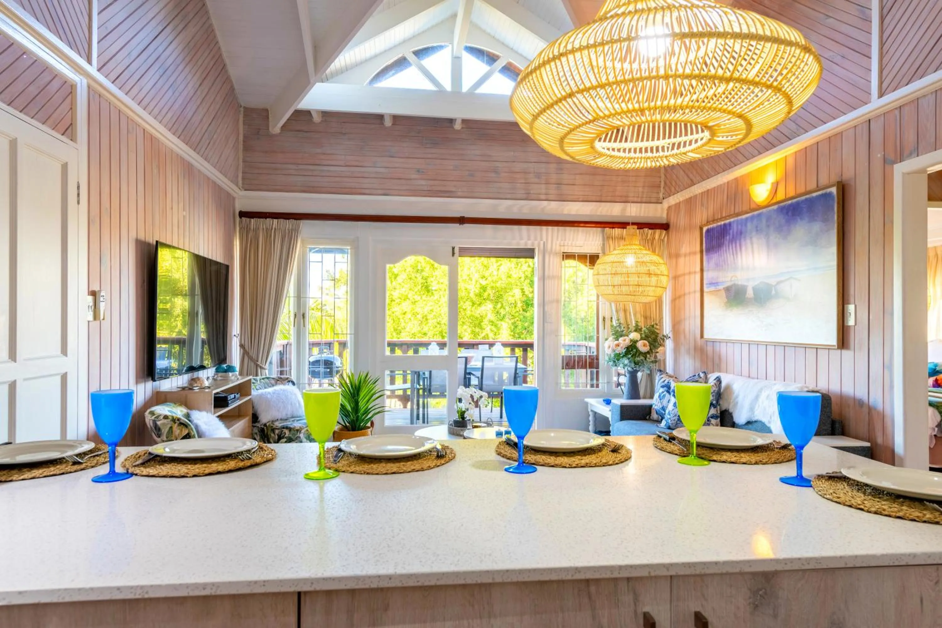 Communal lounge/ TV room in Knysna River Club by First Private Stays