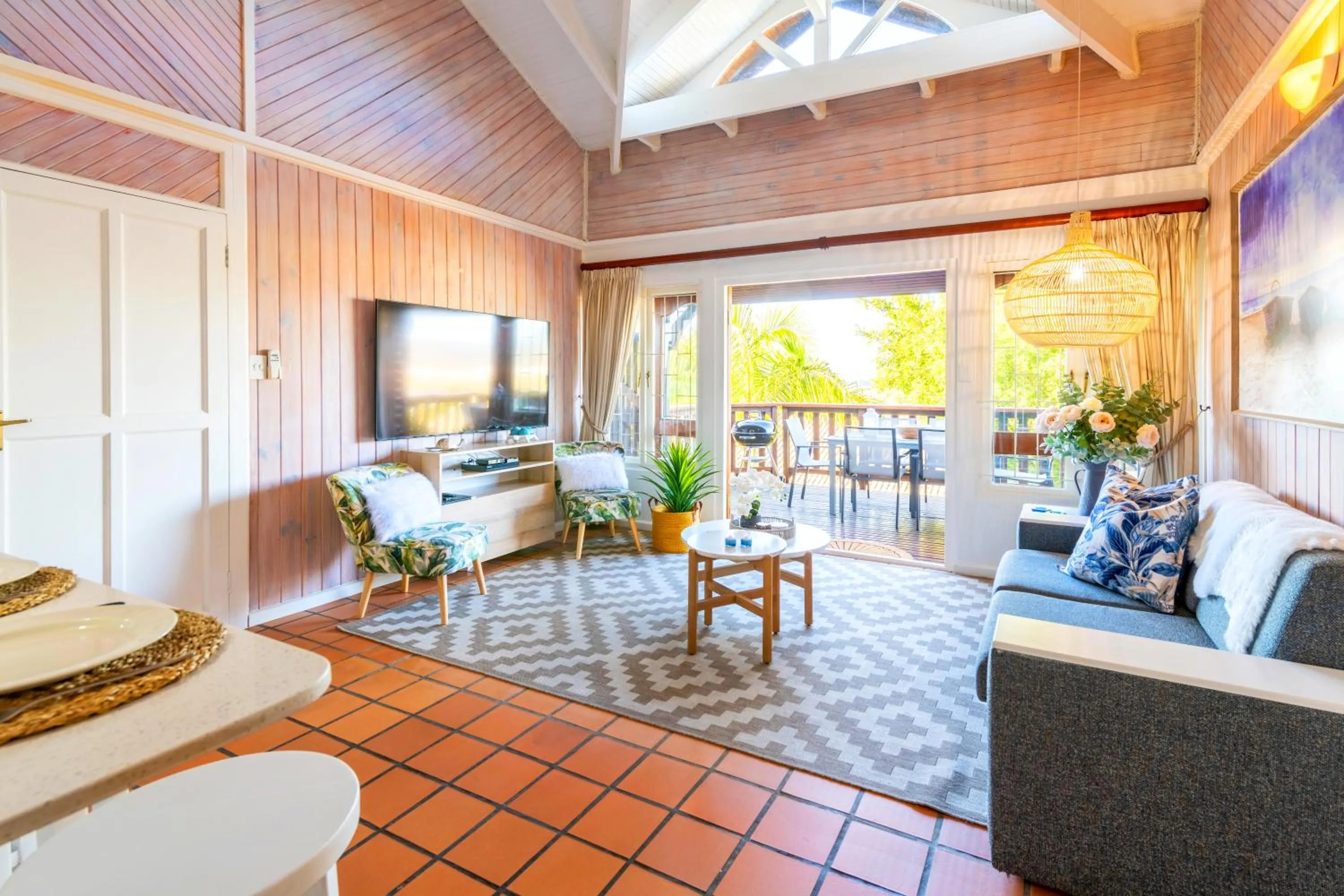 Communal lounge/ TV room in Knysna River Club by First Private Stays