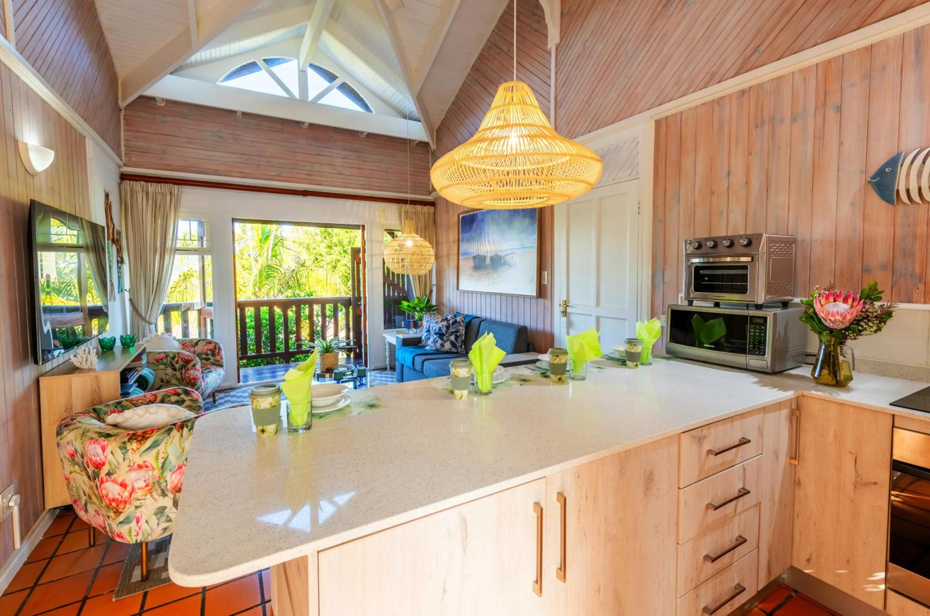 Communal lounge/ TV room in Knysna River Club by First Private Stays