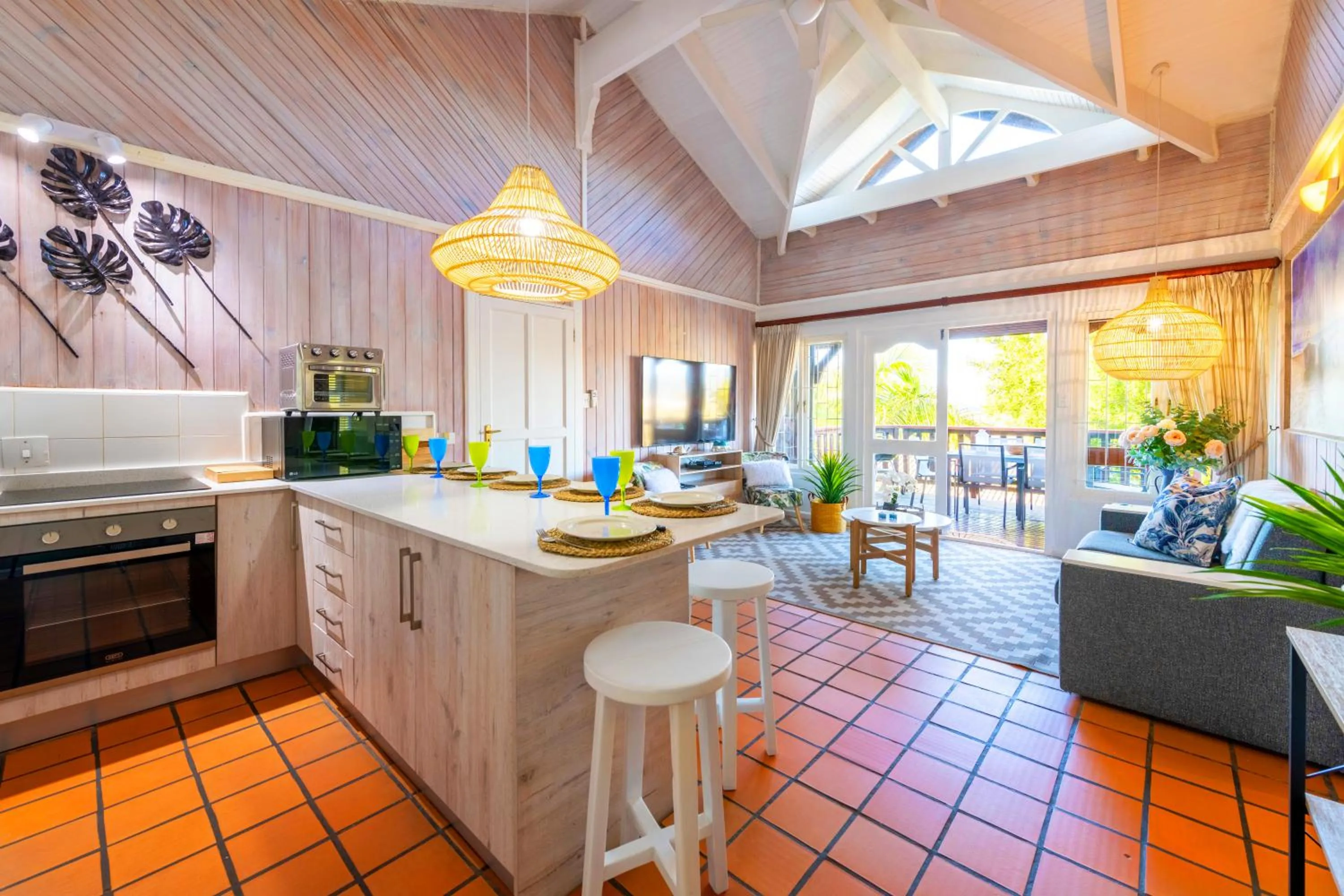 Communal lounge/ TV room in Knysna River Club by First Private Stays