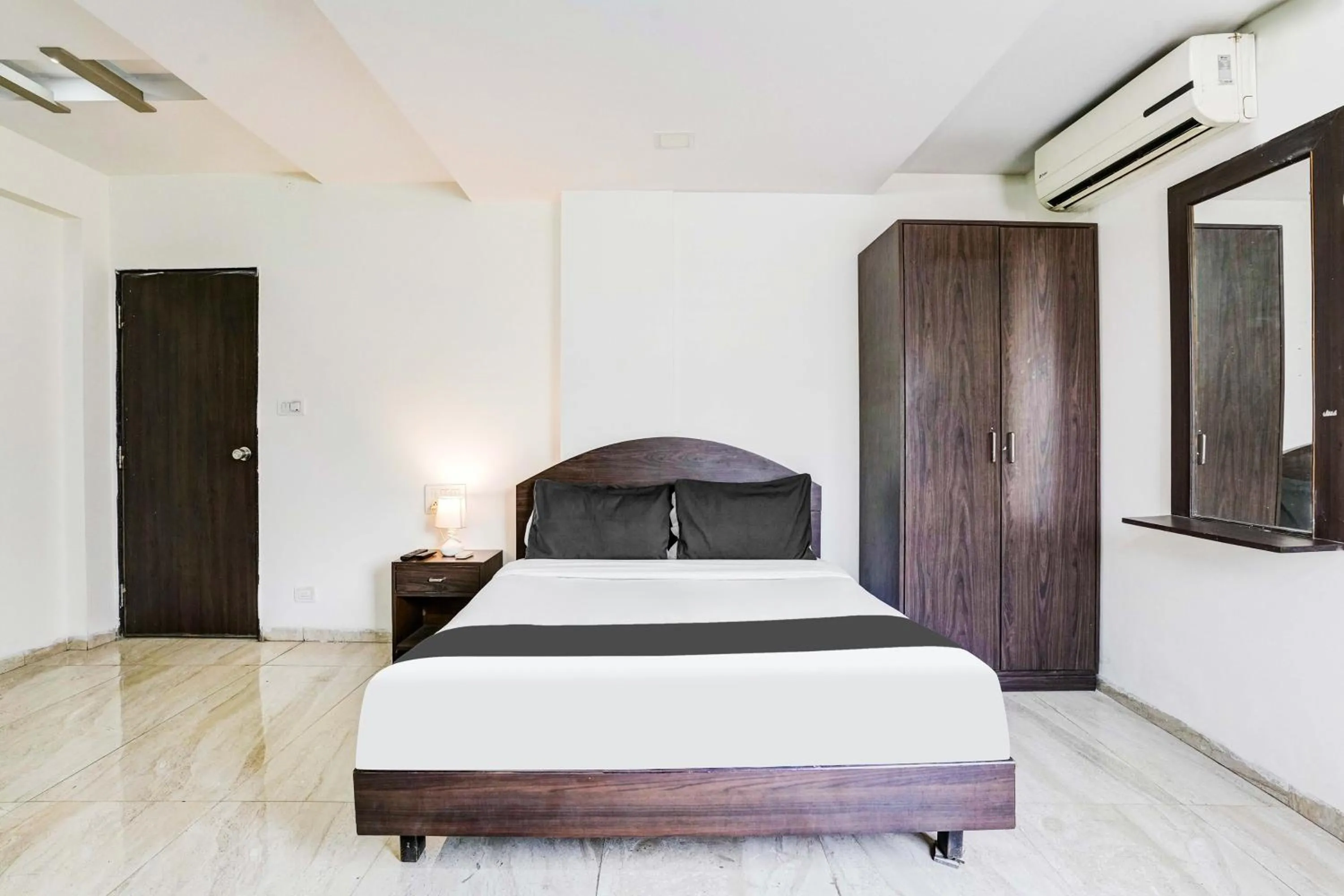 Bedroom, Bed in FabHotel Sahara Inn - Nr Vijay Mamta Theatre, Nashik Road