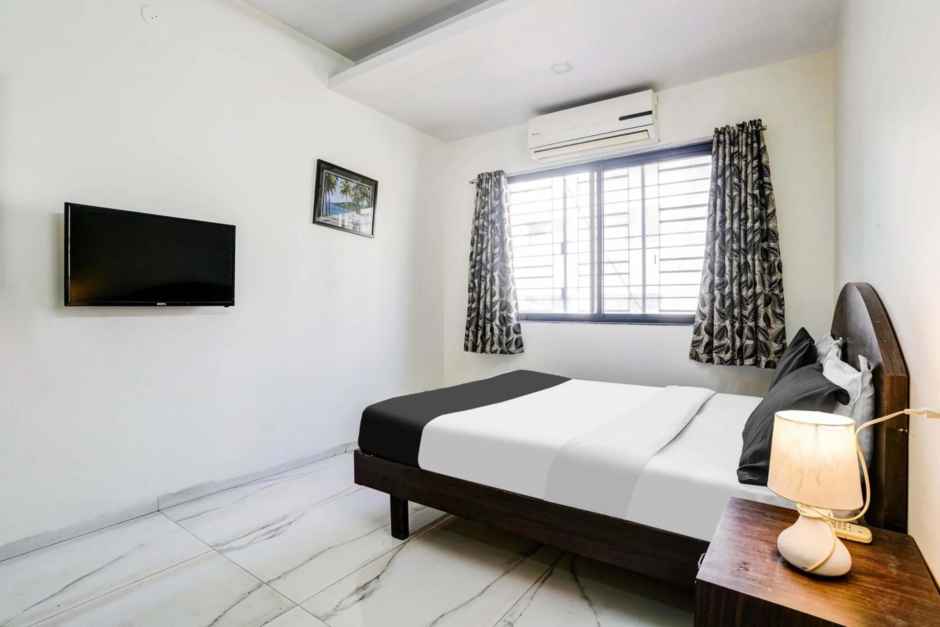 Bedroom, Bed in FabHotel Sahara Inn - Nr Vijay Mamta Theatre, Nashik Road