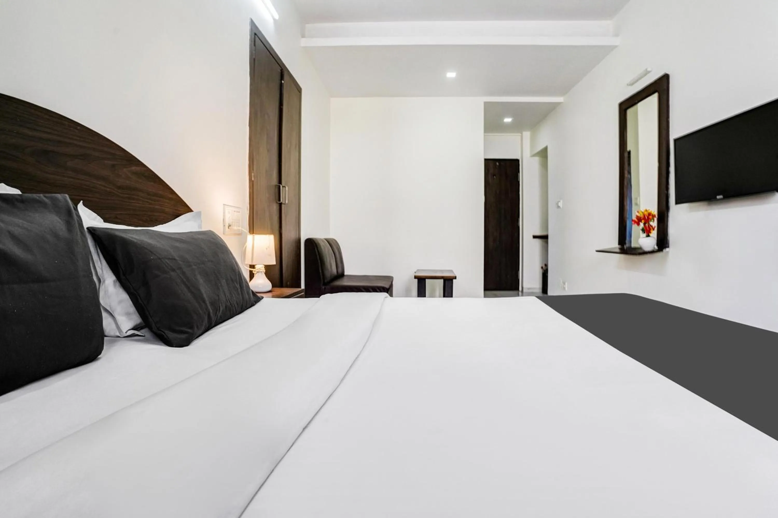 Bedroom, Bed in FabHotel Sahara Inn - Nr Vijay Mamta Theatre, Nashik Road