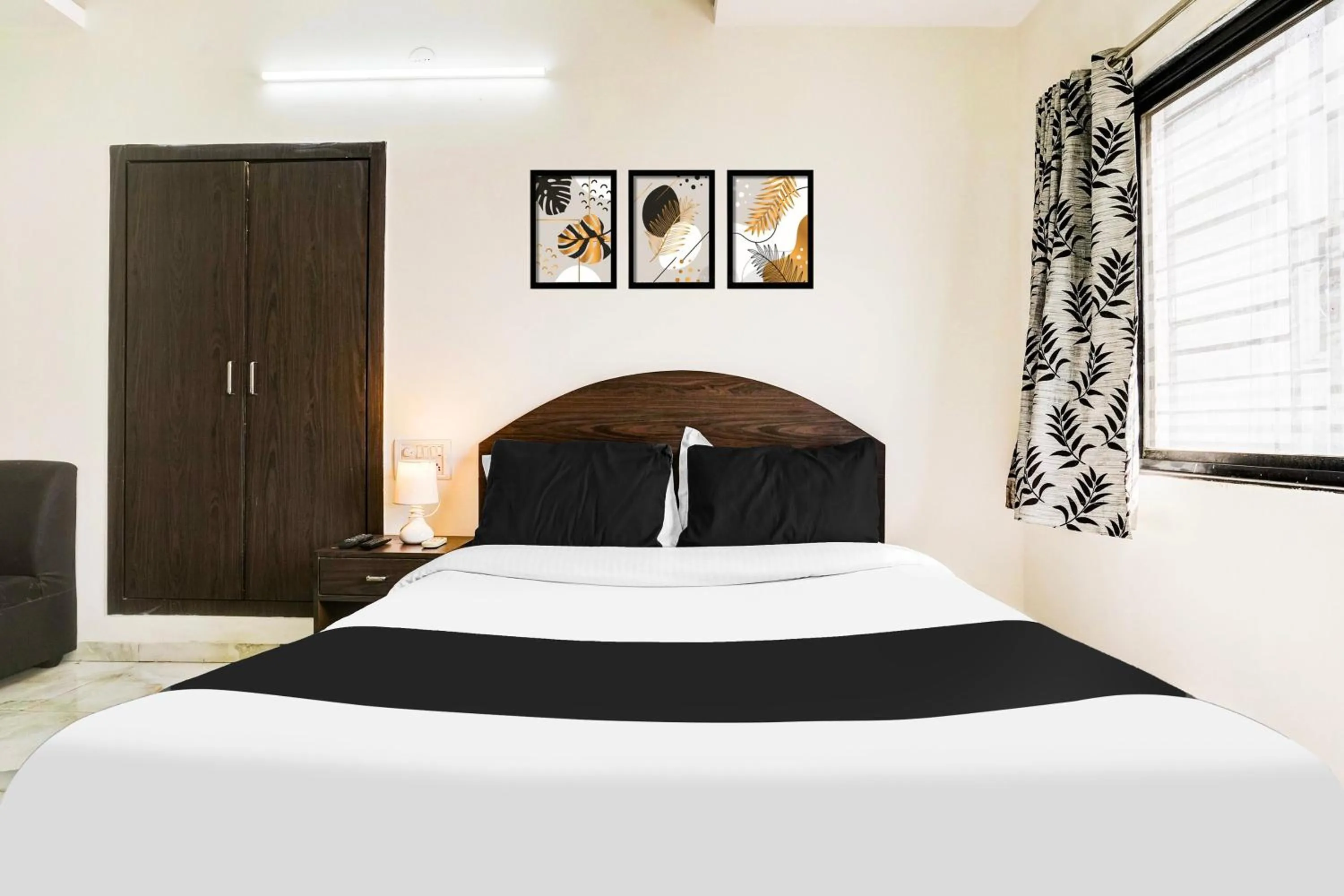 Bedroom, Bed in FabHotel Sahara Inn - Nr Vijay Mamta Theatre, Nashik Road