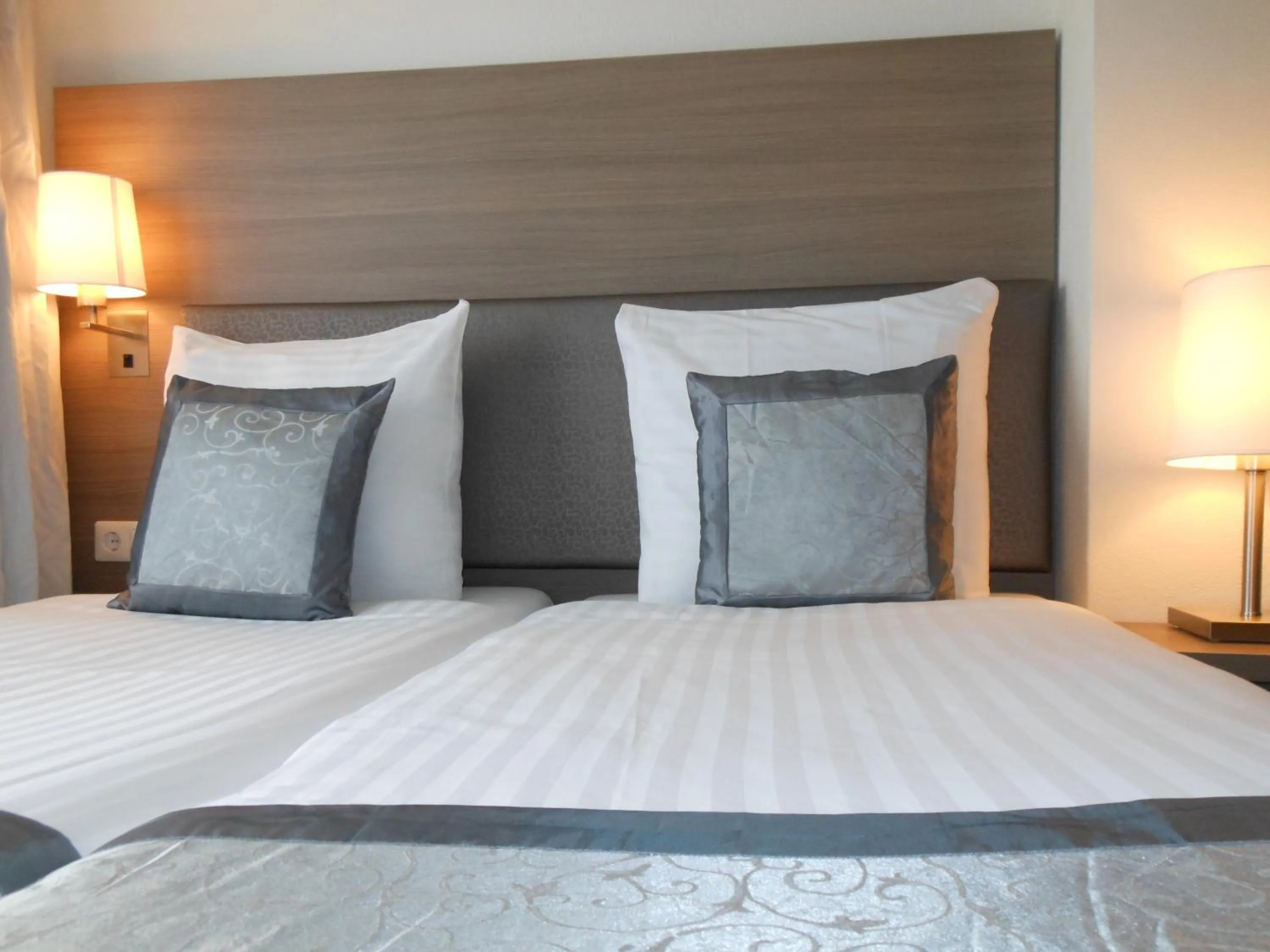 Bed in The Concert Hotel