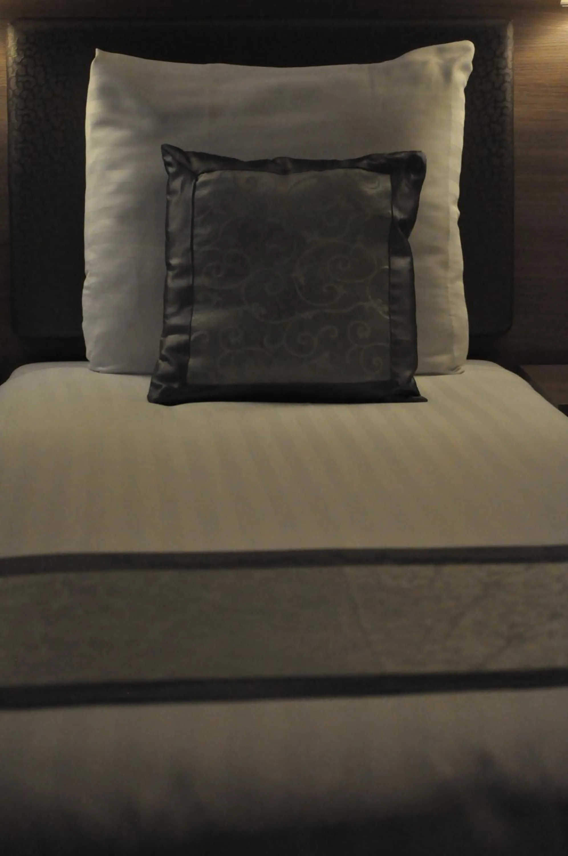 Bed in The Concert Hotel