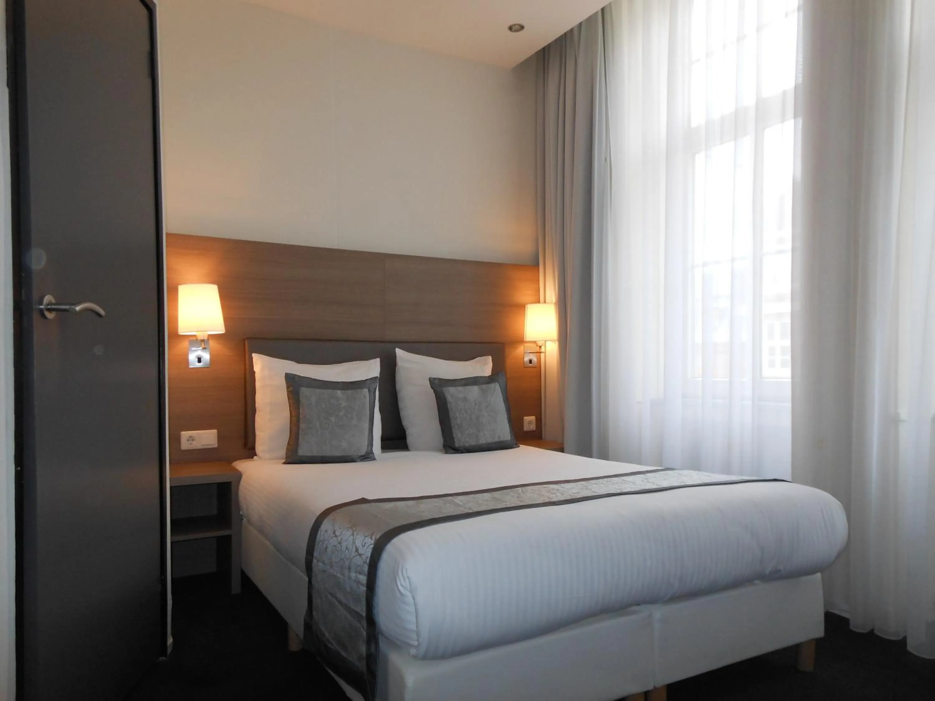 Bed in The Concert Hotel