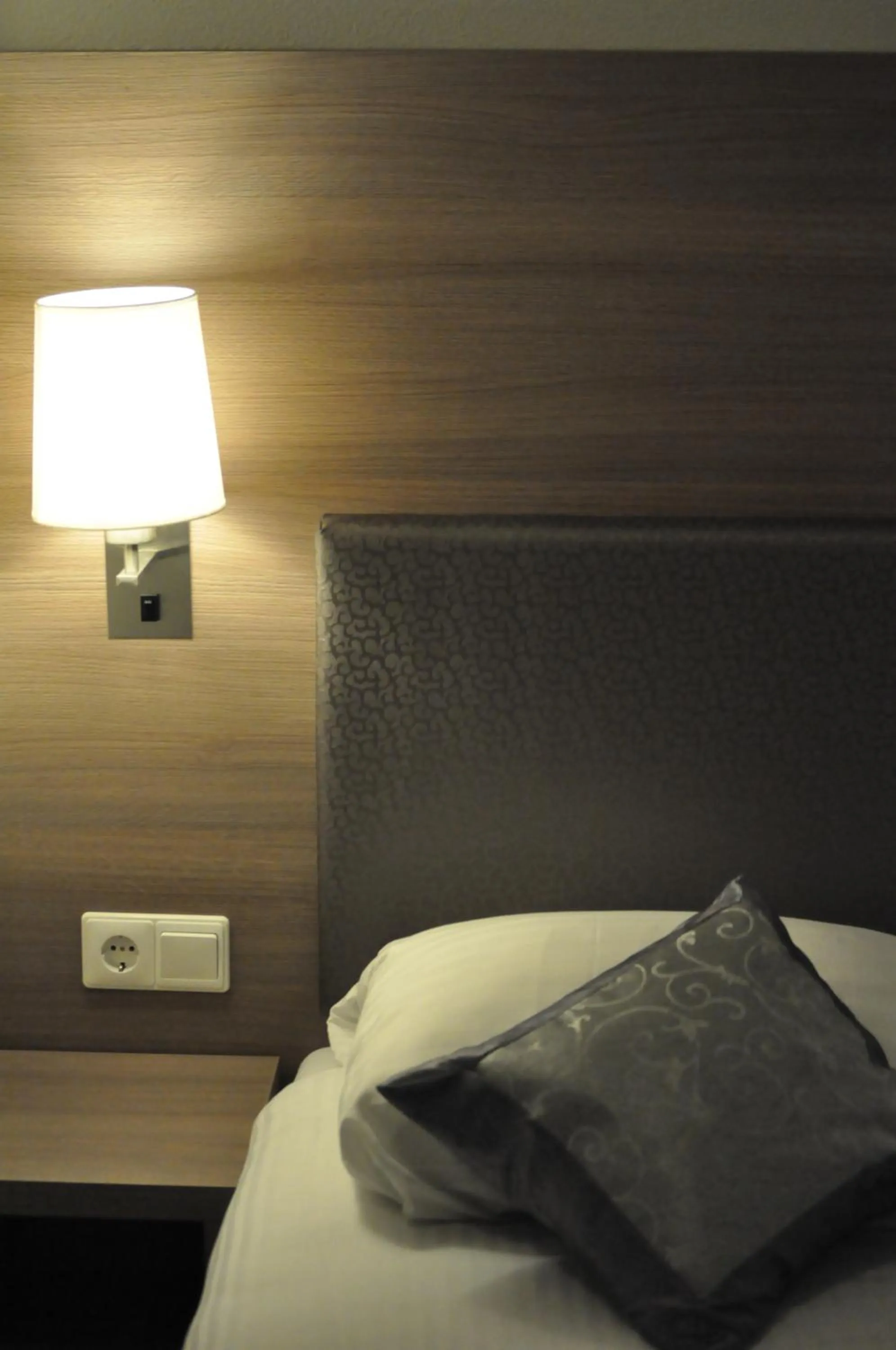 Bed in The Concert Hotel