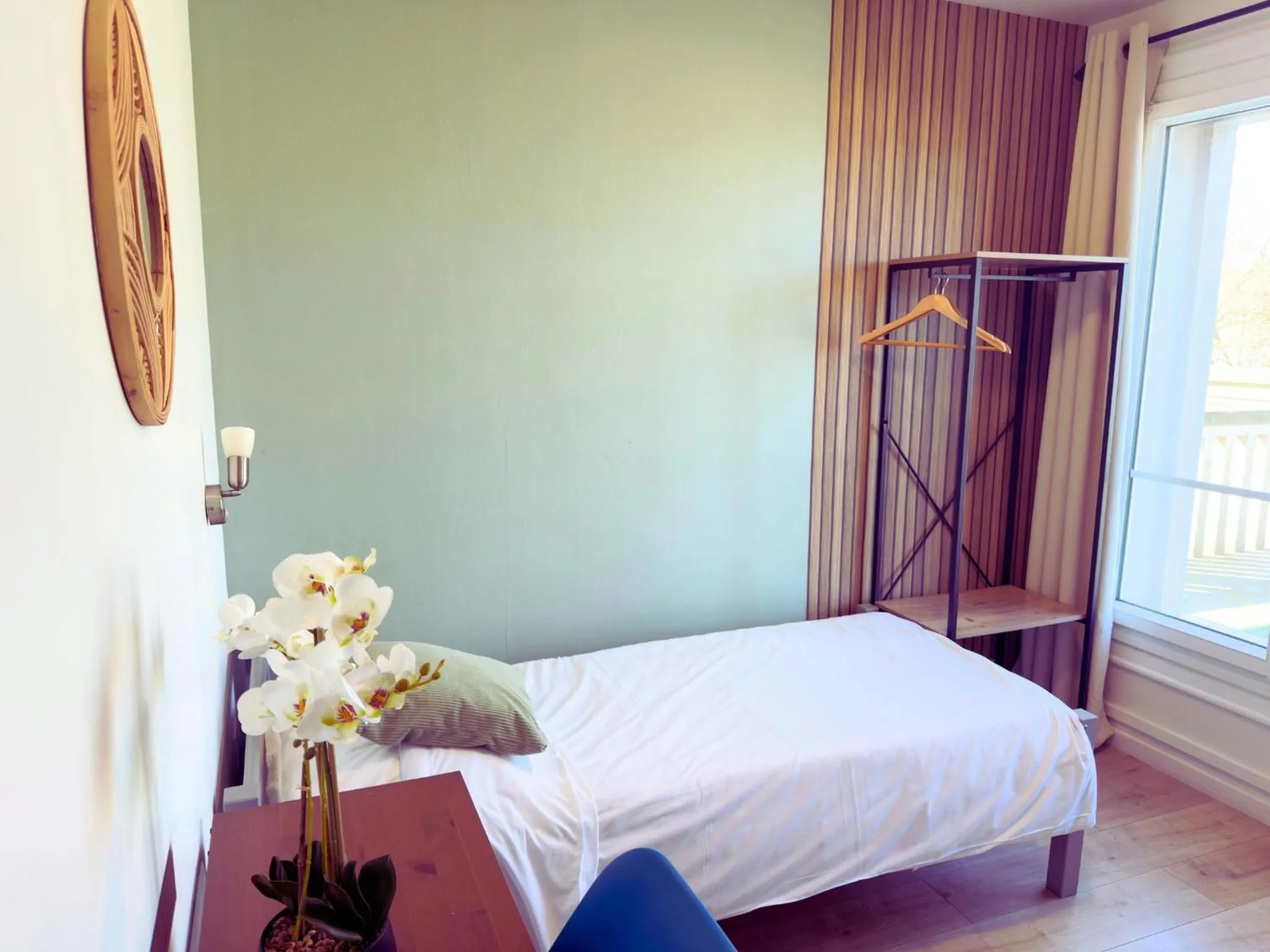 Bed in L'Escale Appartements et Suites en bord de Mer