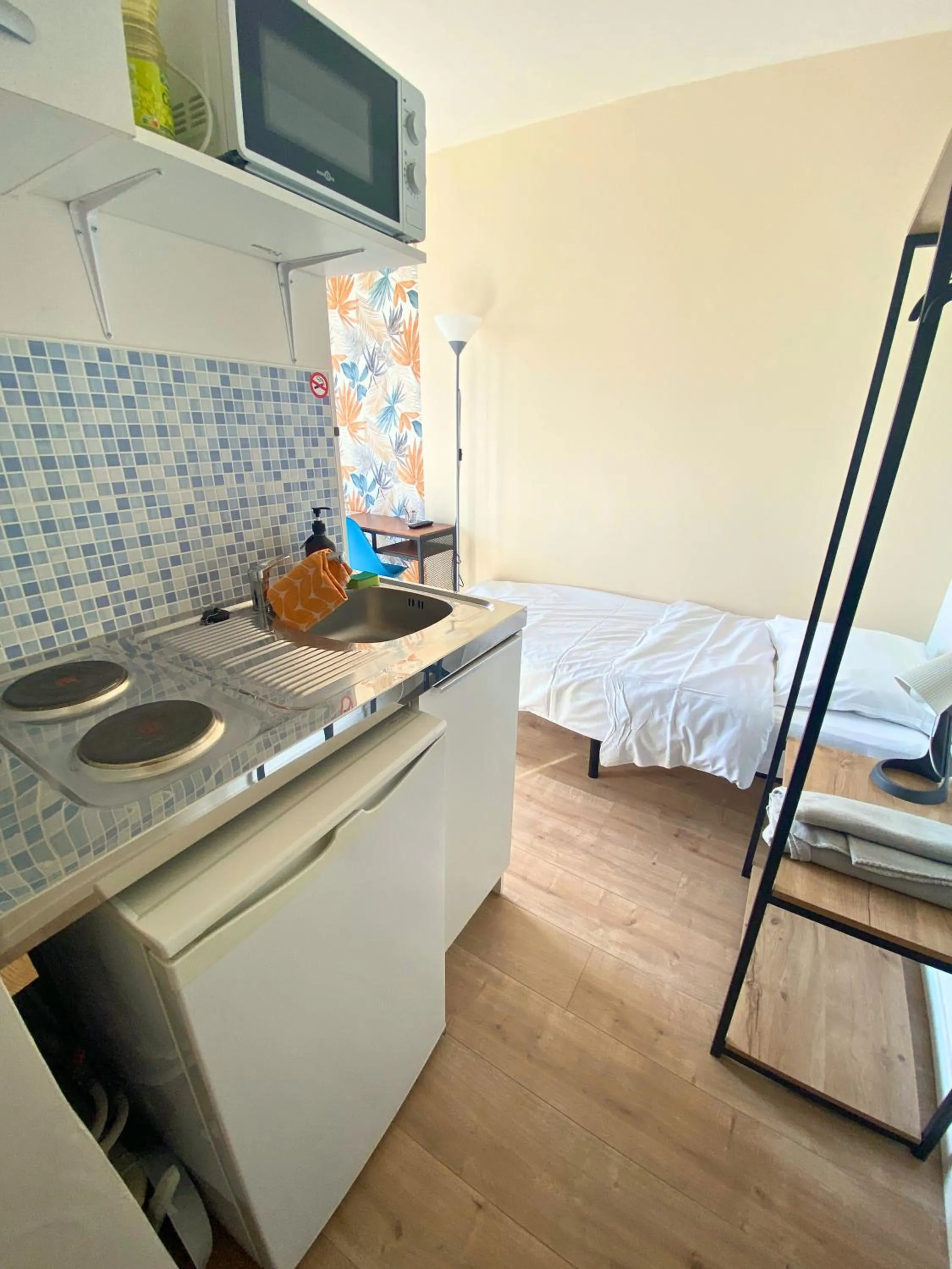 Bed in L'Escale Appartements et Suites en bord de Mer