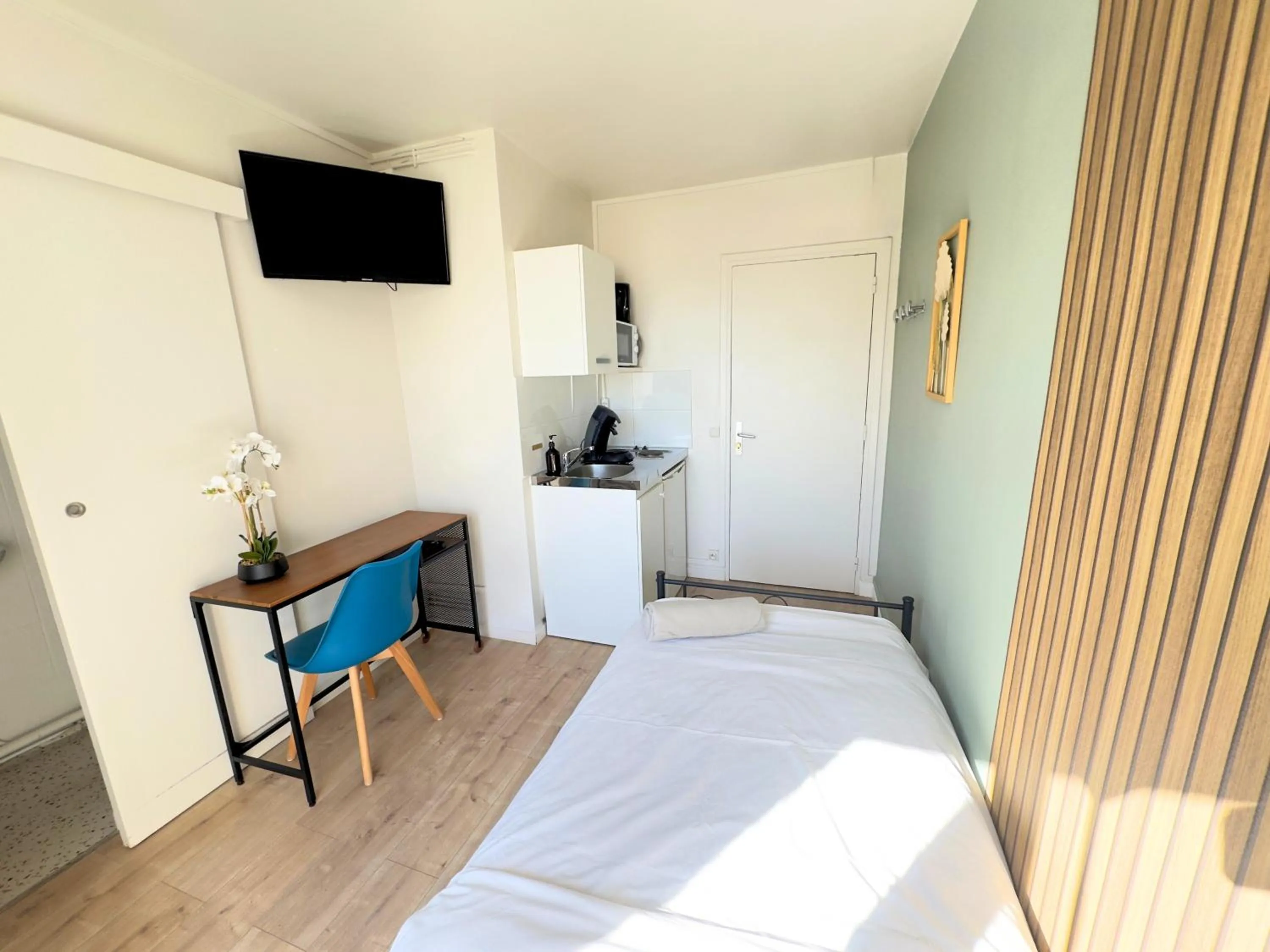 Bed in L'Escale Appartements et Suites en bord de Mer