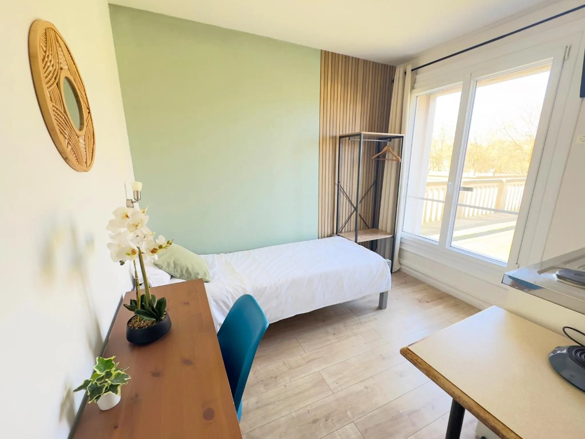 Bed in L'Escale Appartements et Suites en bord de Mer