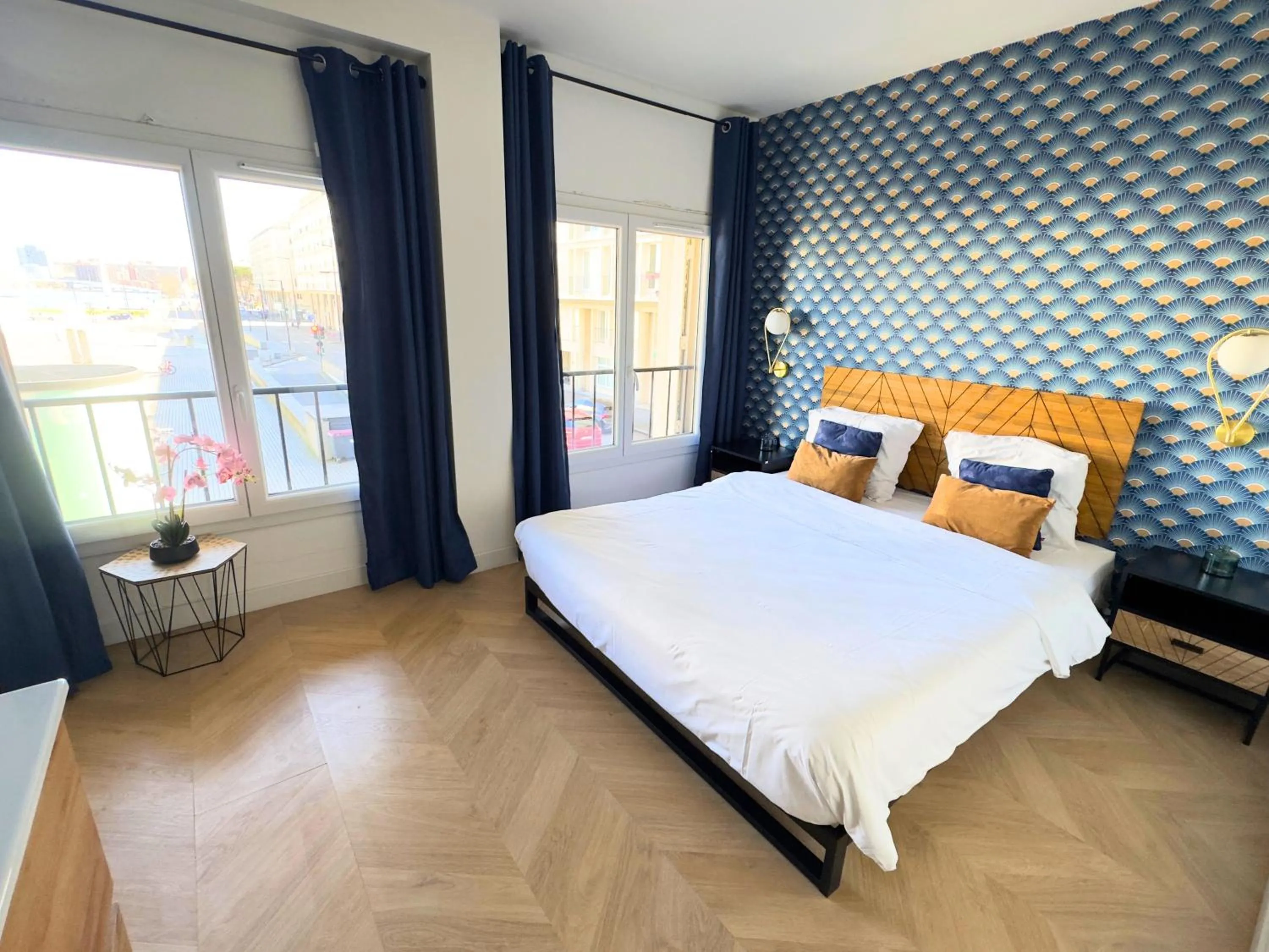 Bed in L'Escale Appartements et Suites en bord de Mer