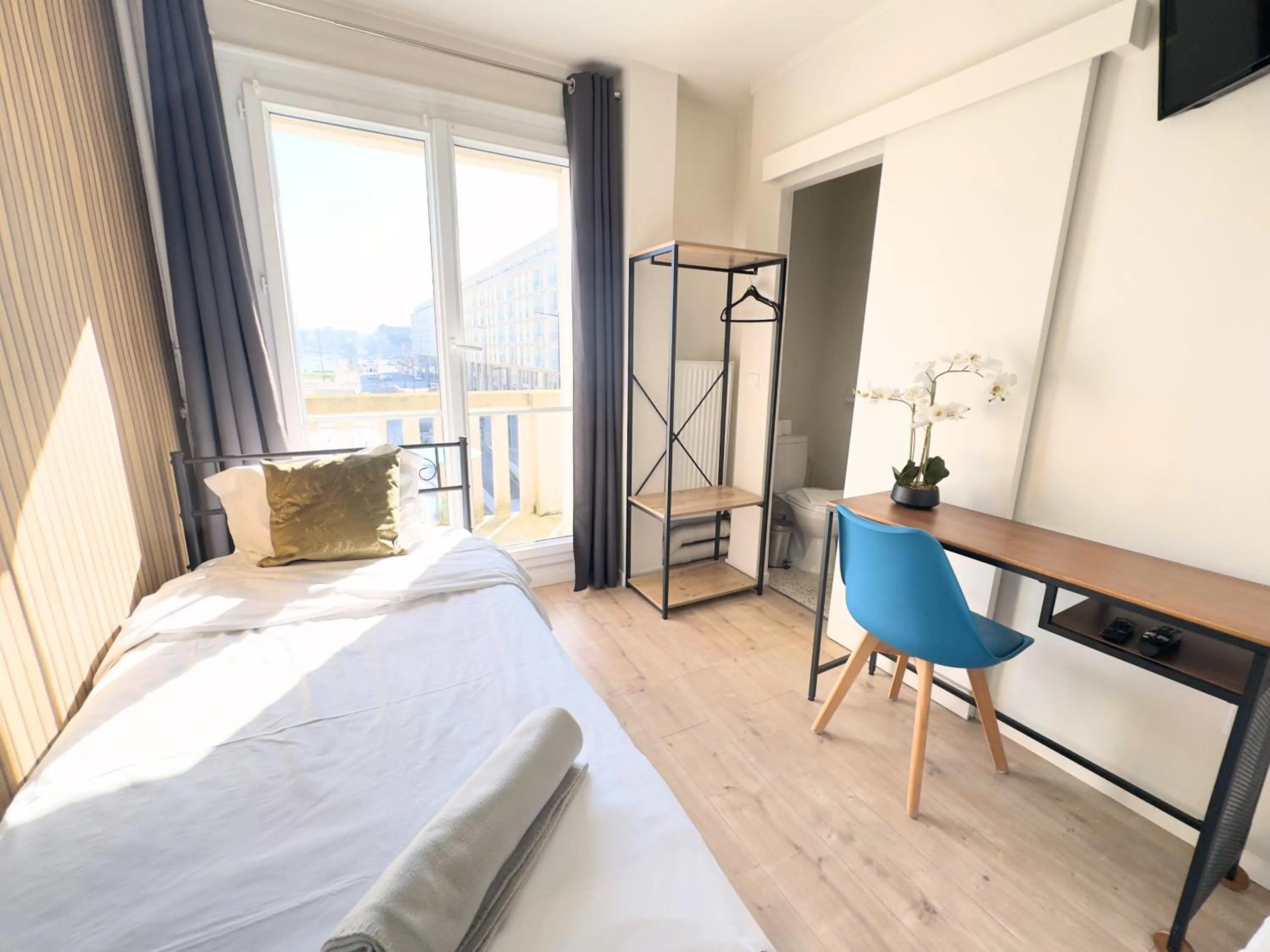 Bed in L'Escale Appartements et Suites en bord de Mer