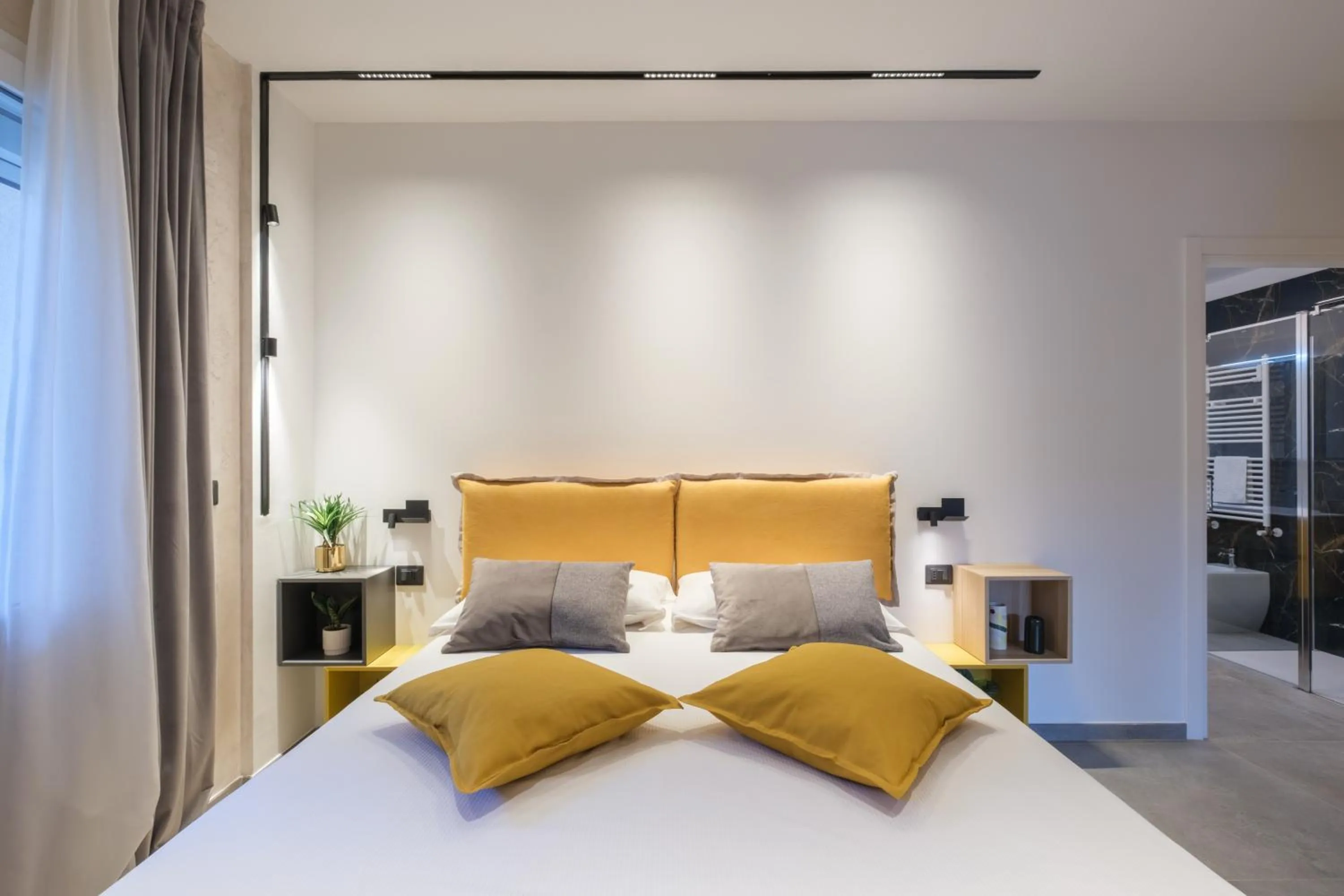 Bed in Tempobiancosuites