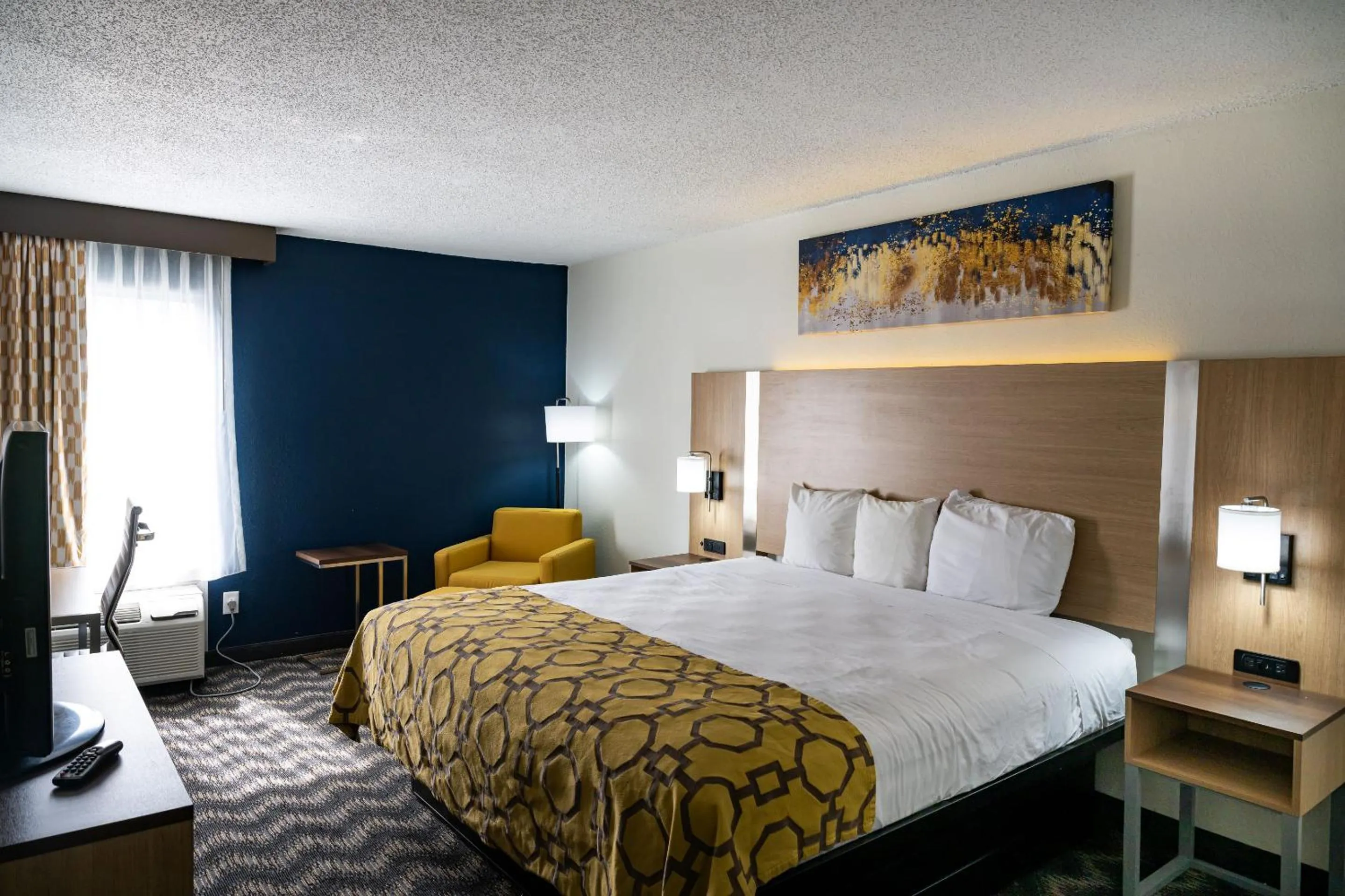 Photo of the whole room, Bed in Baymont by Wyndham Greensboro/Coliseum