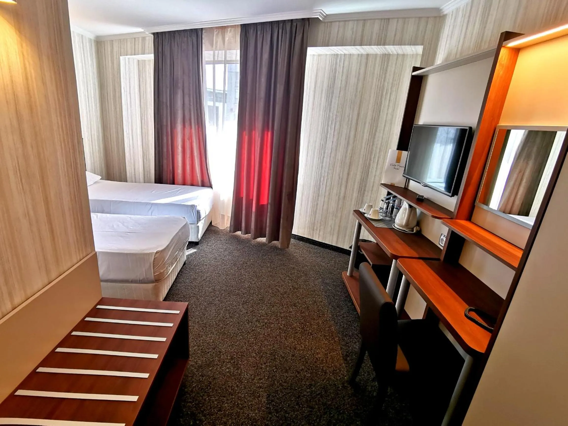 Bed in Elate Plaza Hotel